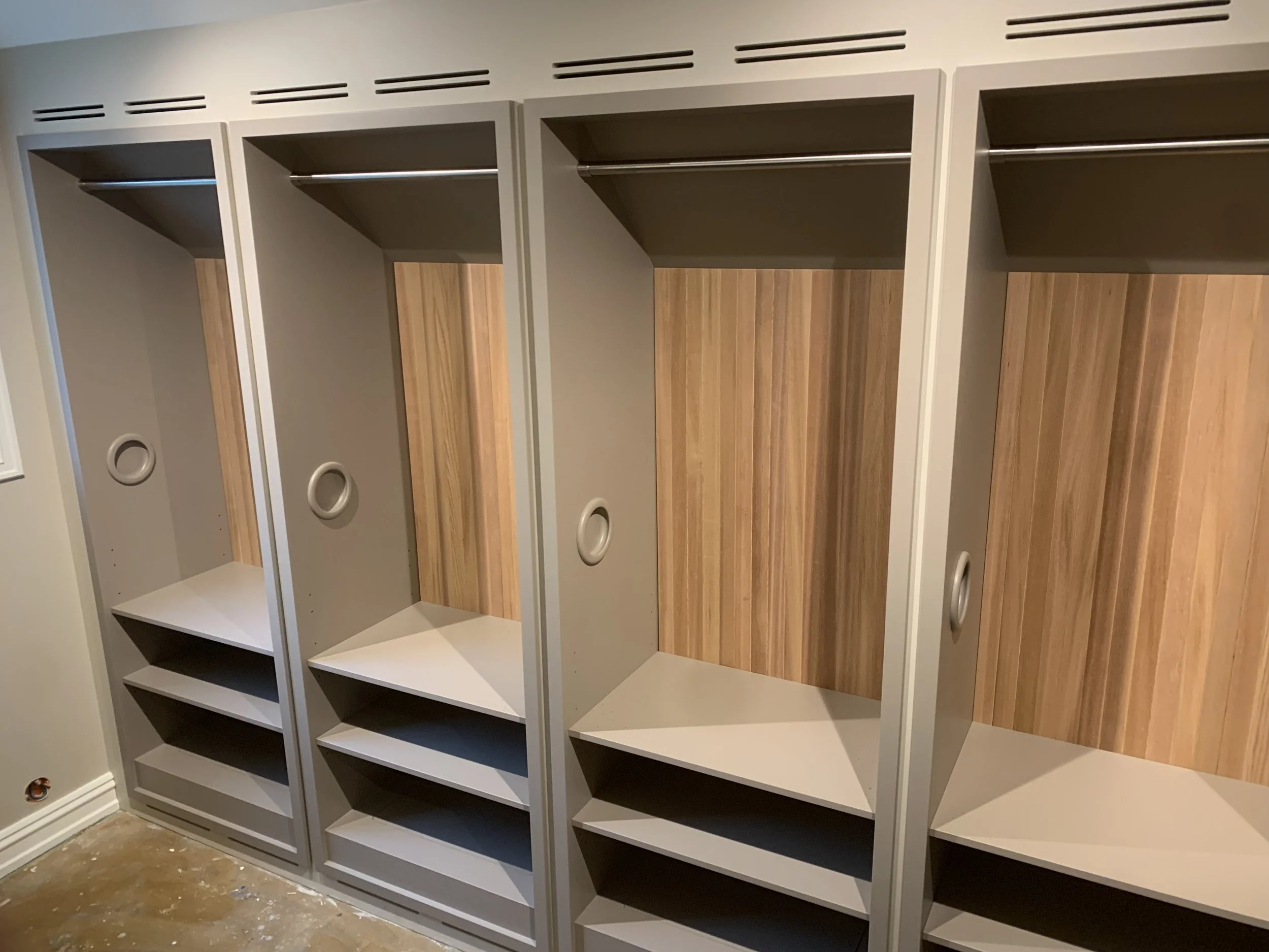 Custom walk-in closet, garderobe, carriage clothing system, cedar closet back panels, pull-out closets, made by Snekker Travis Johnson