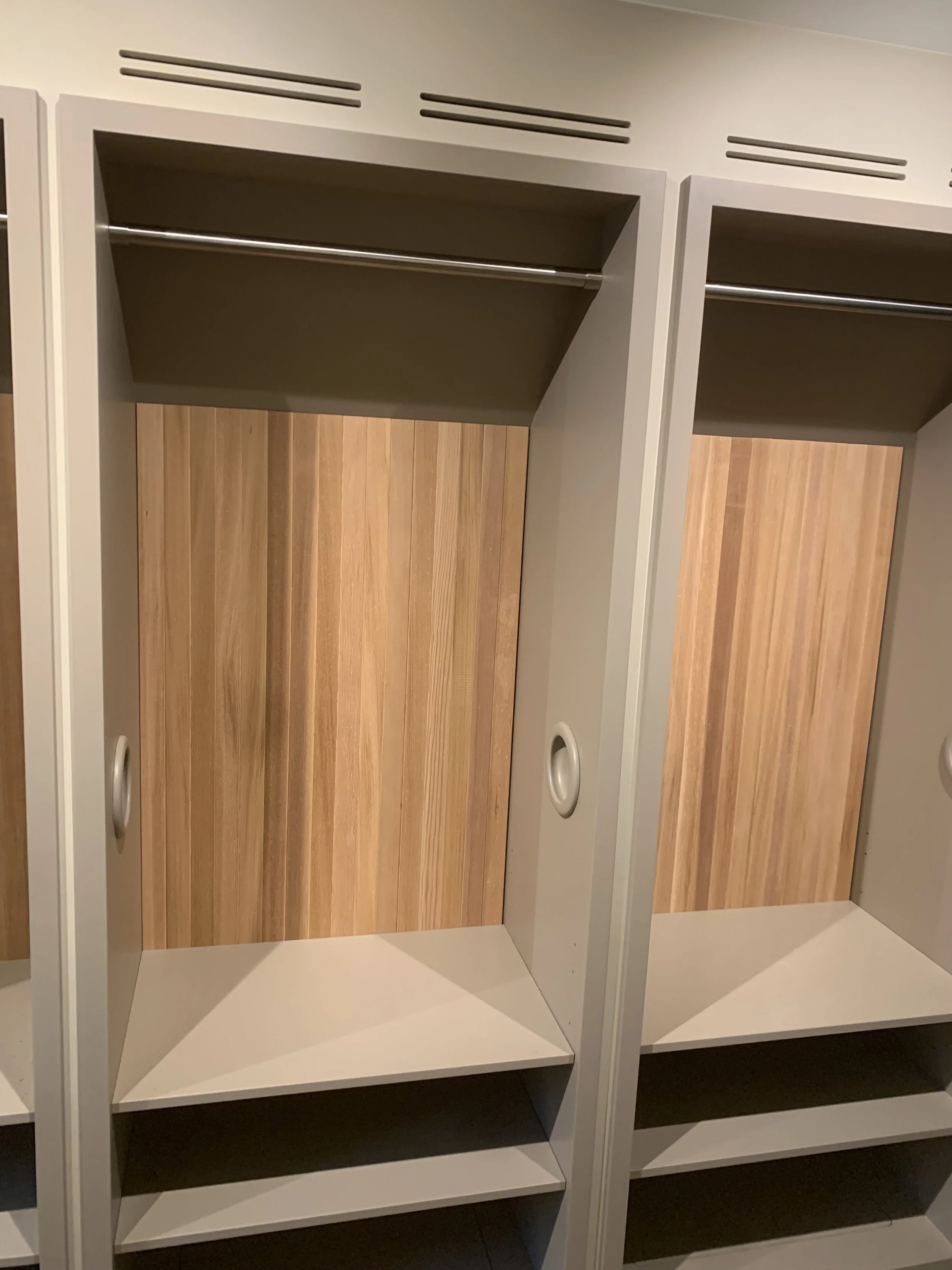 Custom walk-in closet, garderobe, carriage clothing system, cedar closet back panels, pull-out closets, made by Snekker Travis Johnson