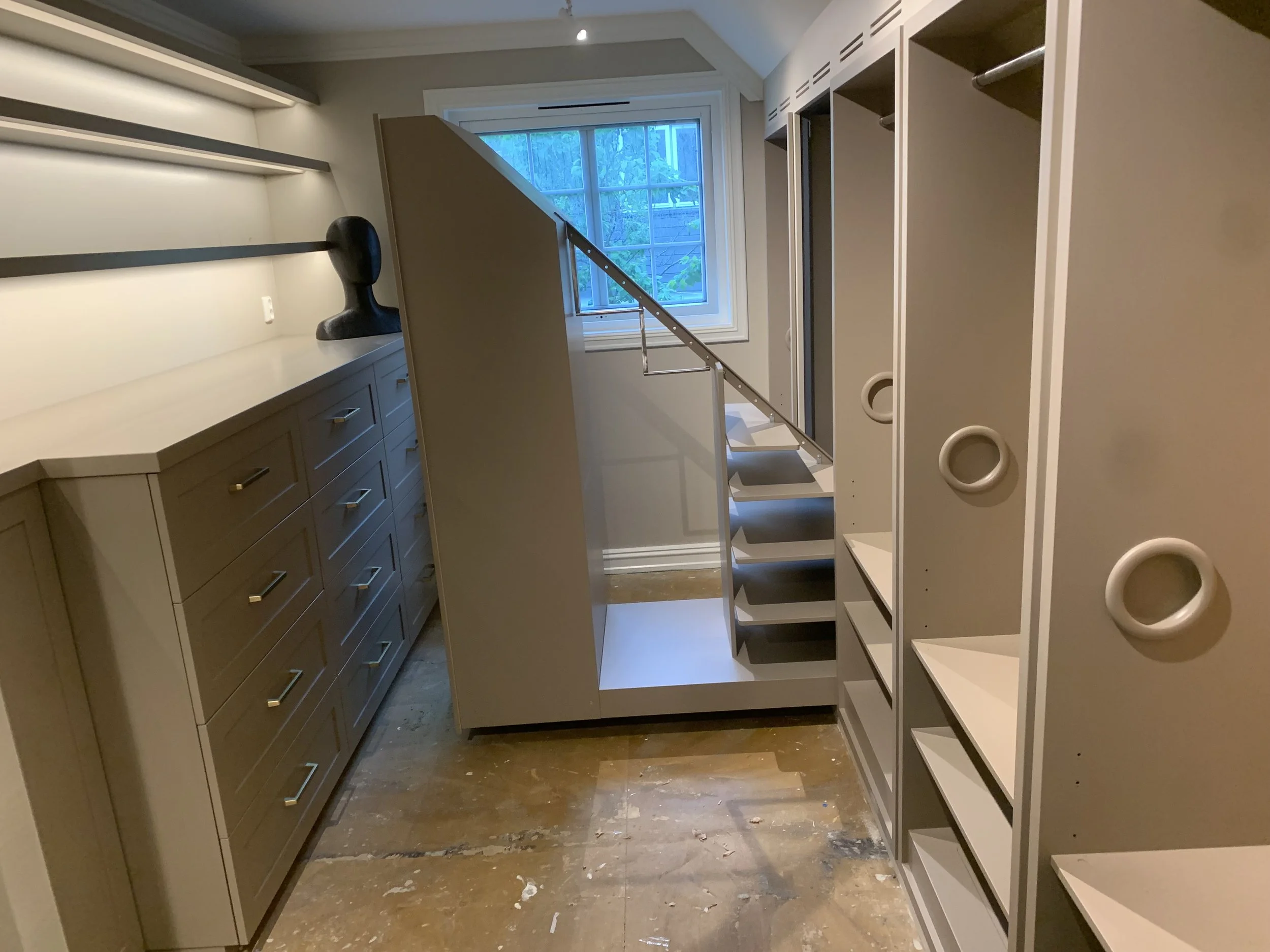 Custom walk-in closet, garderobe, carriage clothing system, cedar closet back panels, pull-out closets, made by Snekker Travis Johnson