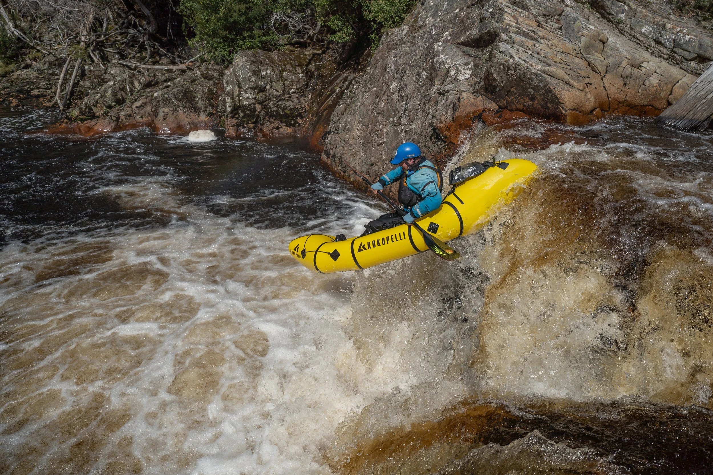 Mark Oates boofing a drop on an Advanced Whitewater Packrafting Course for Packrafting Tasmania