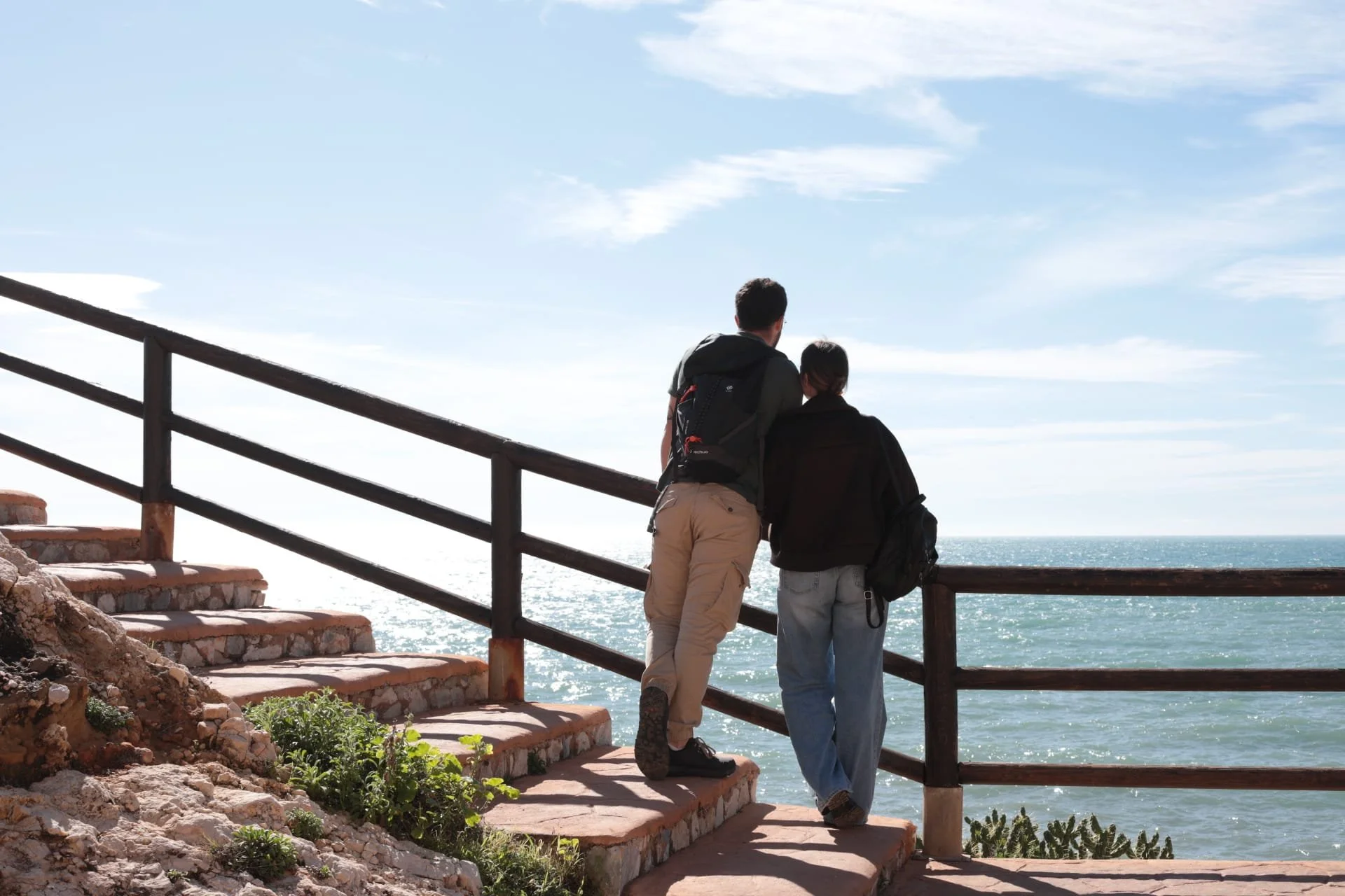 Juanlu and Sanne overlooking the sea and the cliffs of Rincon de la Victoria
