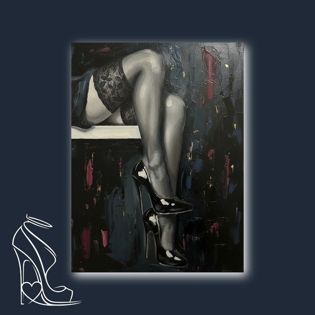 A captivating study of stiletto allure, featuring lace-trimmed hold-up stockings, a provocatively raised leg, and the gleaming embrace of patent leather heels.