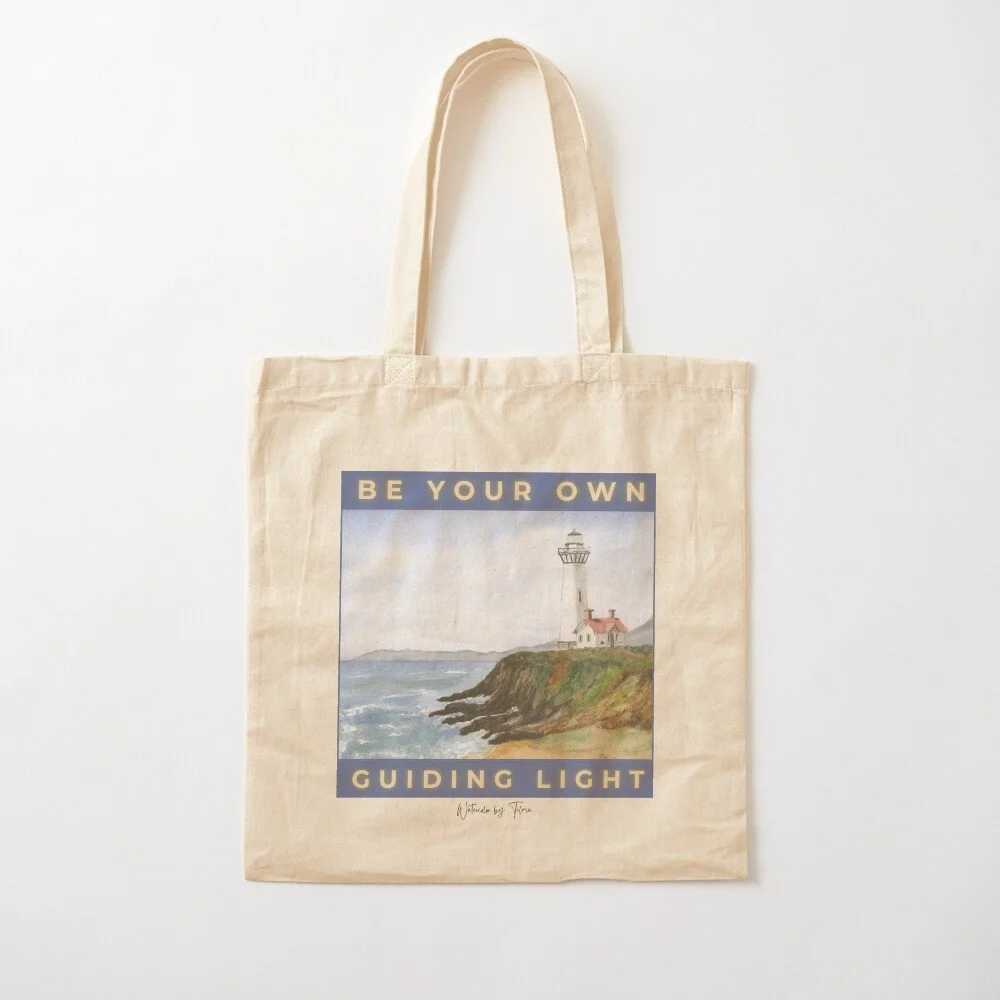 Lighthouse in a Cliff Tote Bag