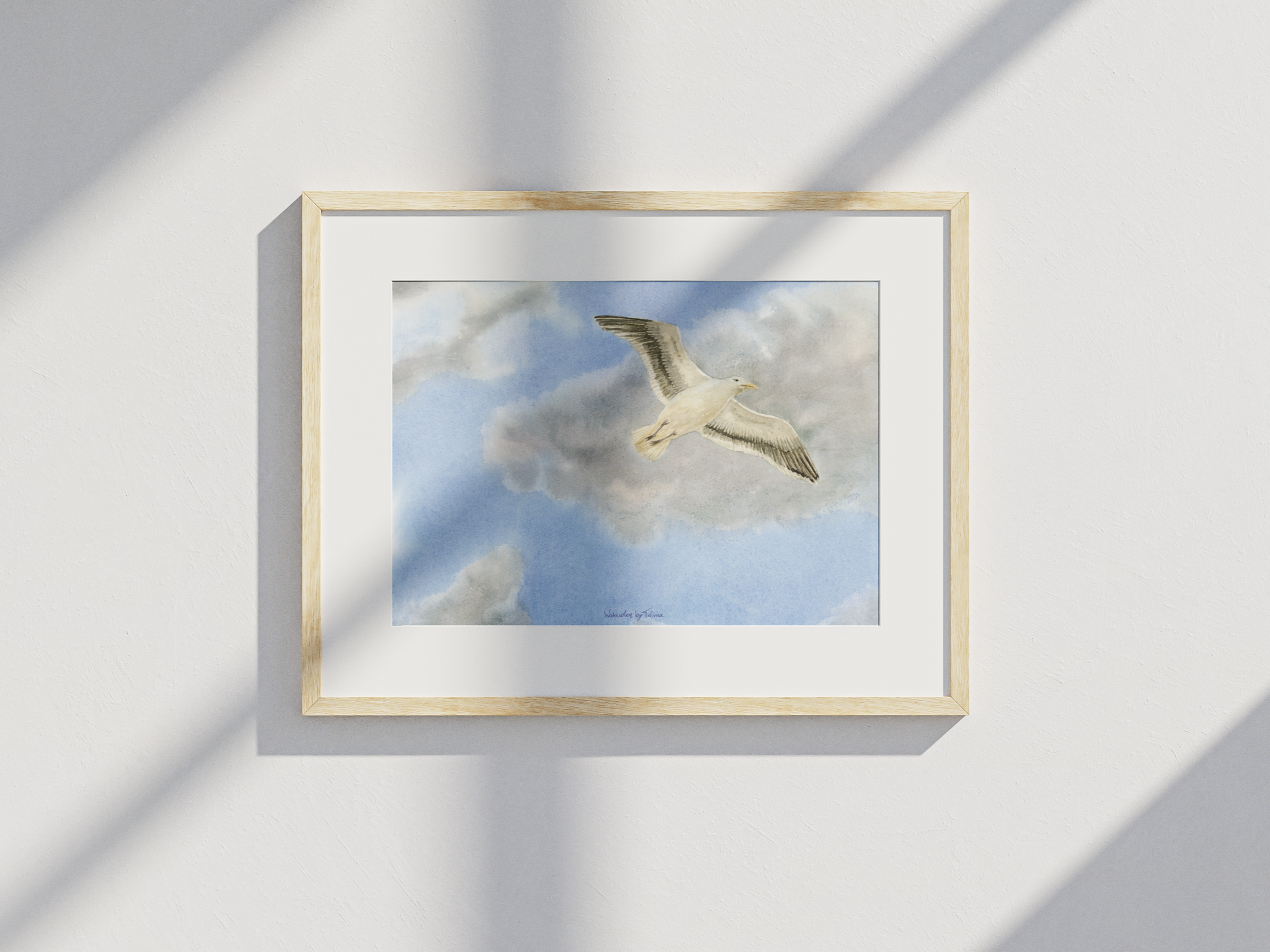 Seagull Flying in Clouds