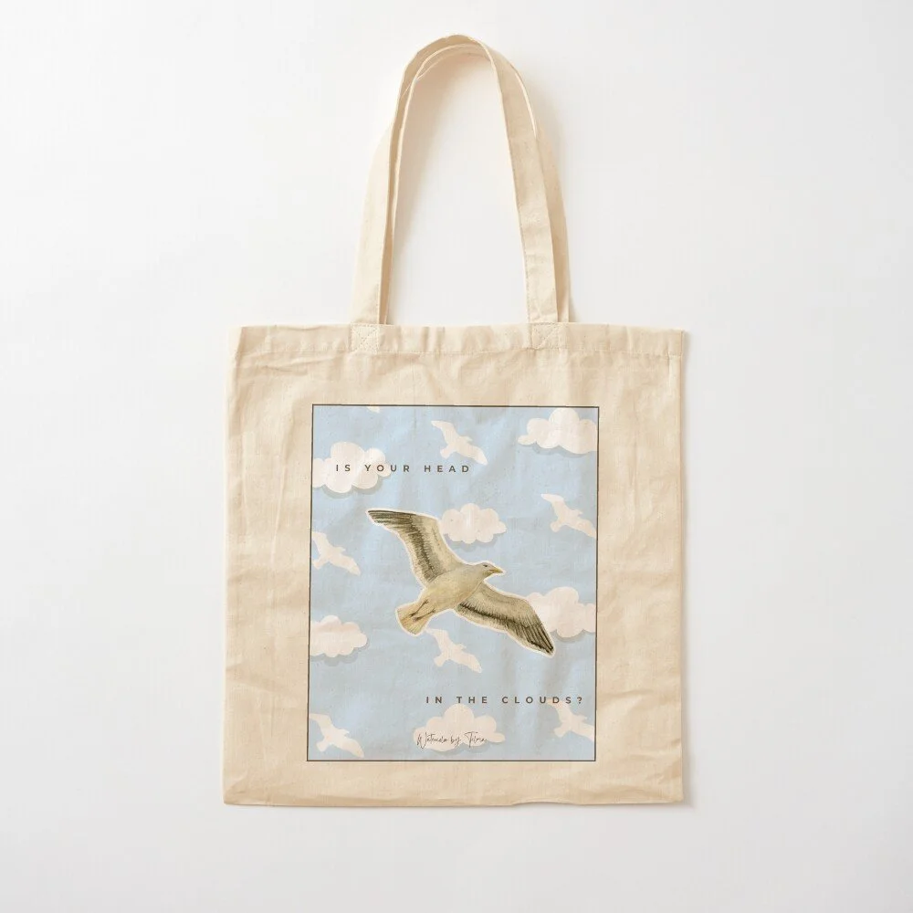 Seagull Flying in Clouds Tote Bag