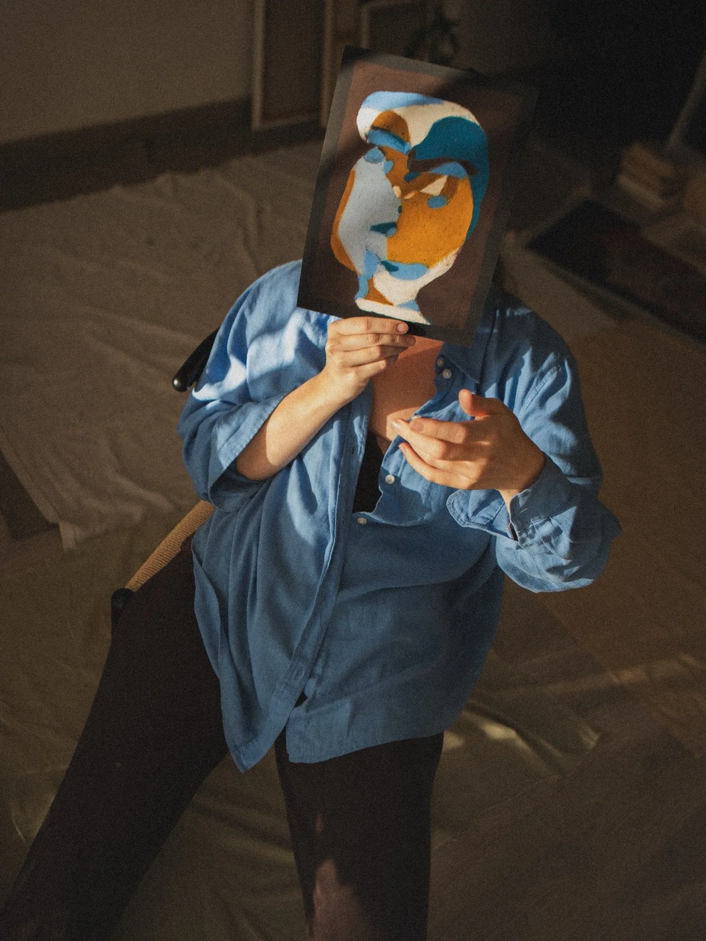 One of my favorite images from the recent photoshoot with @elliday.
My artwork worn as a mask &mdash; a fitting expression of the Between Faces series.
 It explores the social and personal layers of human identity.
Much like the masks we all wear whe