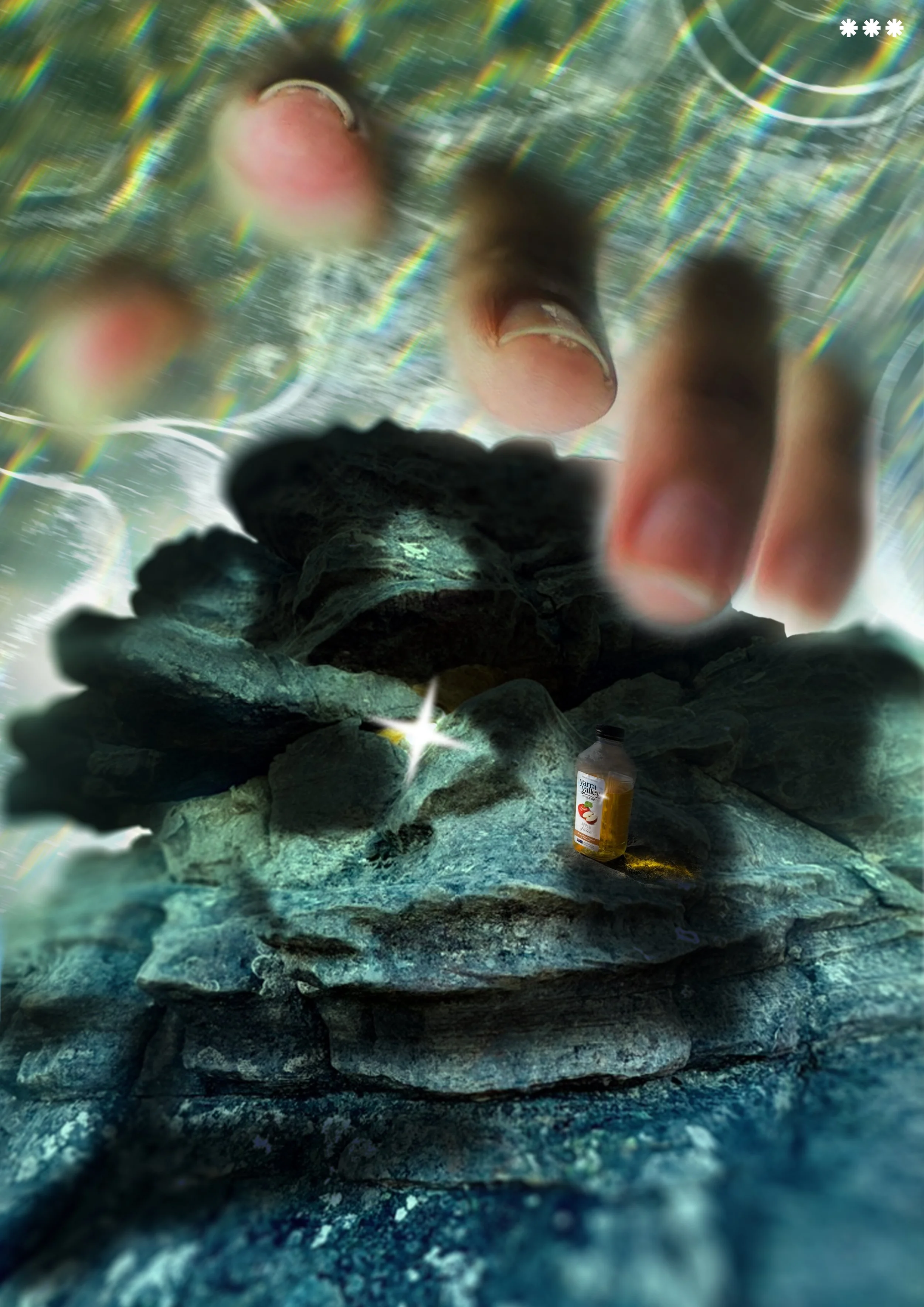 View of a rocky surface with a bottle of apple juice on it, seen from underneath a transparent, textured surface with a hand reaching down towards the rocks. Light reflects off the surface creating rainbow-like patterns.