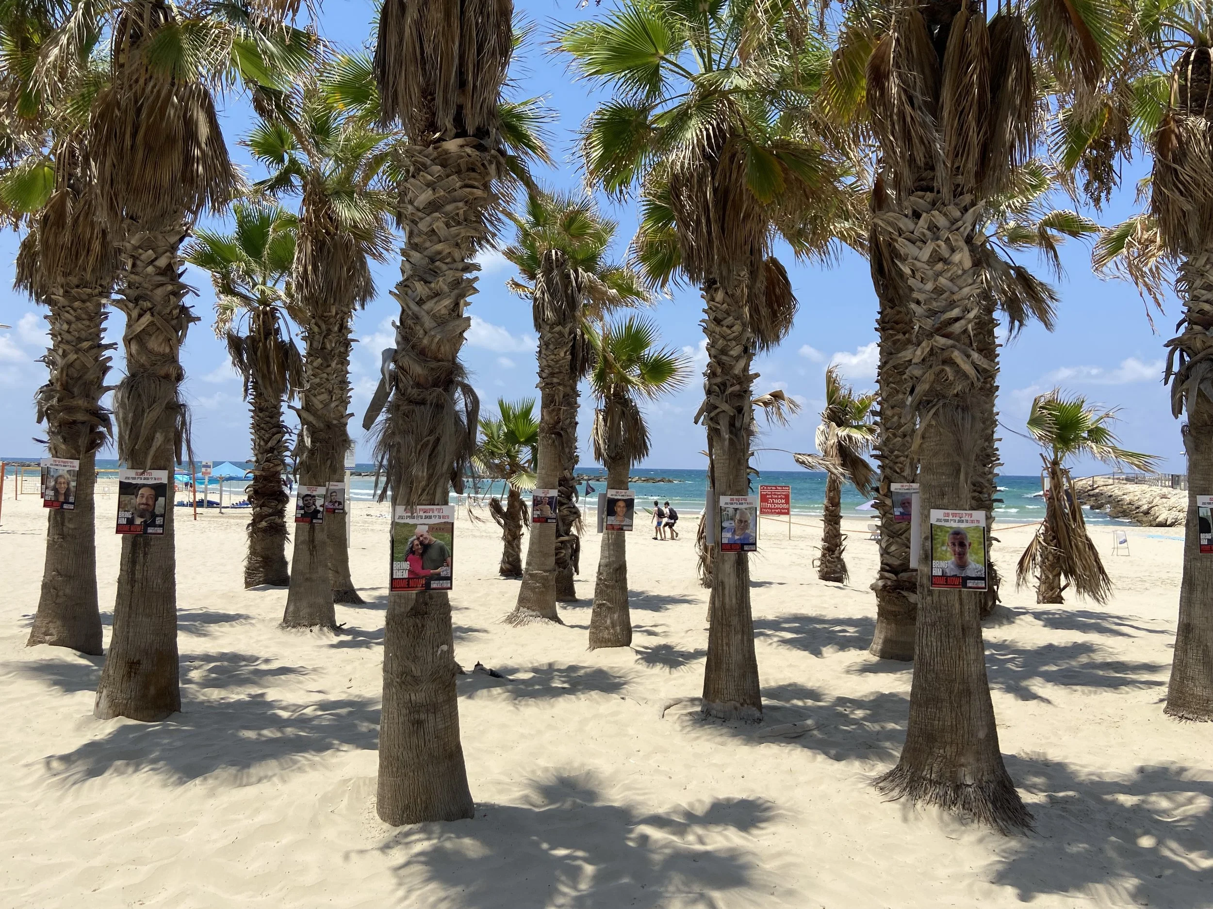 After the October 7th attack, pictures of the hostages were plastered across Israel, including on Tel Aviv's beaches.