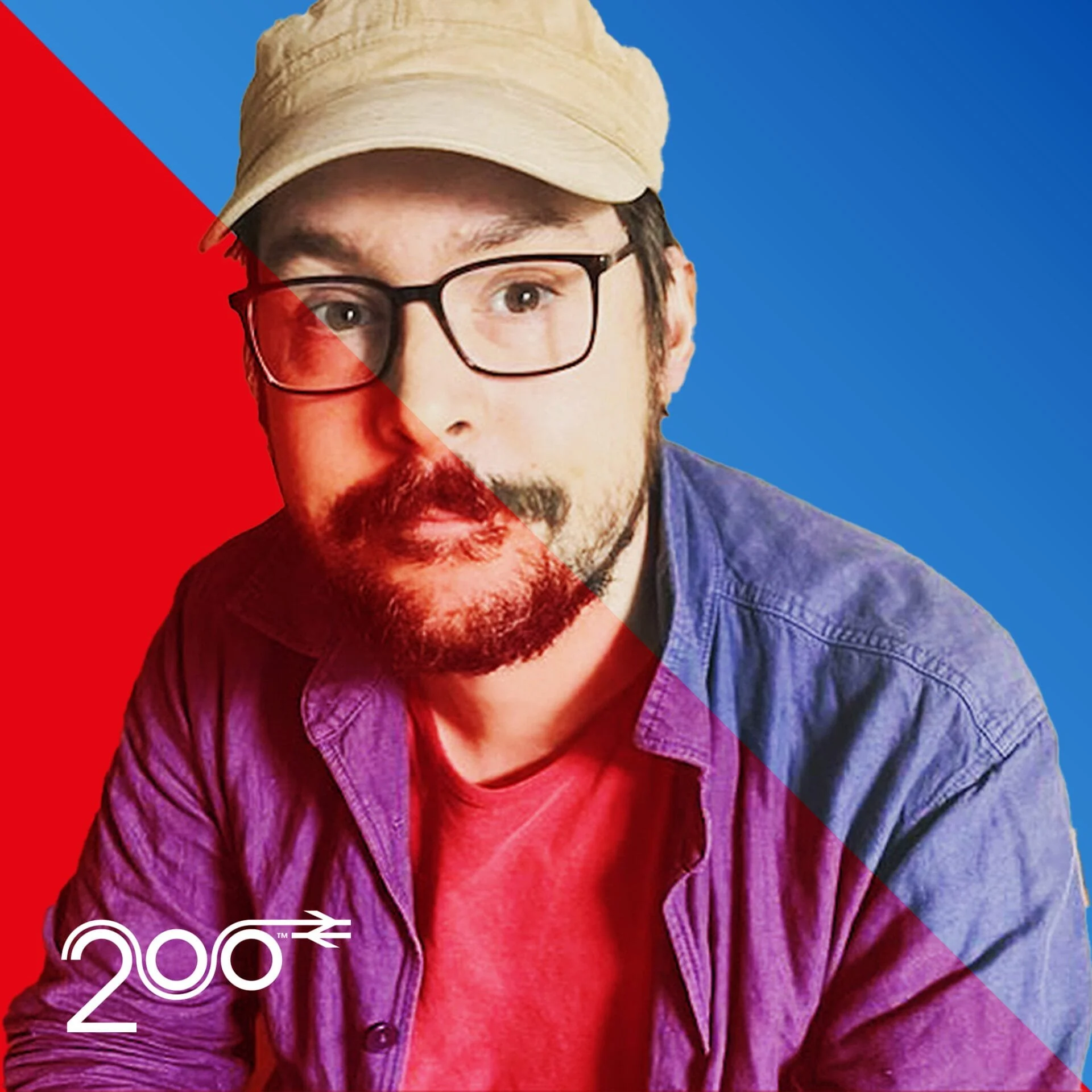 A photo of author Dan Richards. Dan is wearing glasses and a beige cap. Dan is wearing a red t-shirt and purple jacket, he has a slight beard and mustache. A link to a podcast for Railway 200 in which Dan talks about night mail trains.