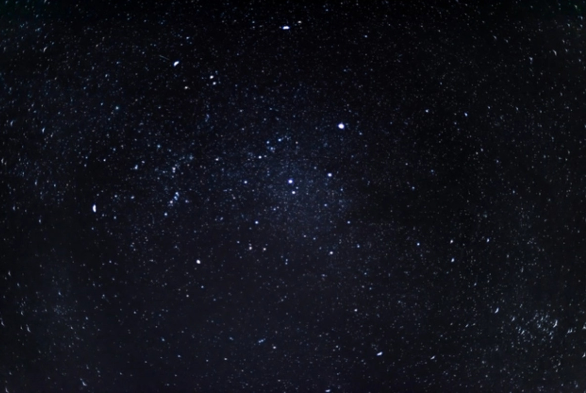 Clear night sky filled with numerous stars and constellations.
