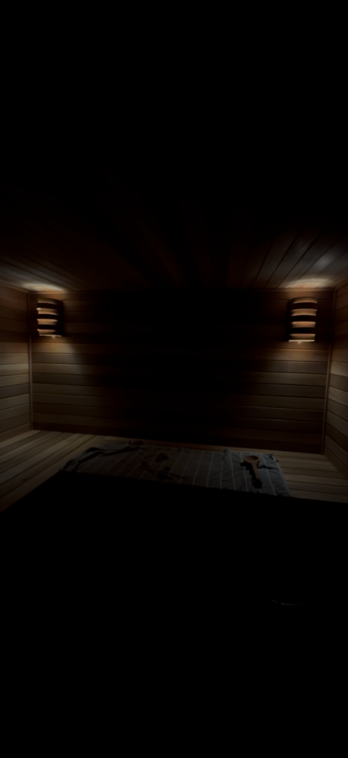Dimly lit wooden sauna interior with dimmable interior sauna lighting. Custom Built Sauna Divine Volts LLC Trusted Distributors. Panel Upgrades, Service Calls, Generators, New Construction, Commercial, Consulting. Contact Today (267)-265-8415 