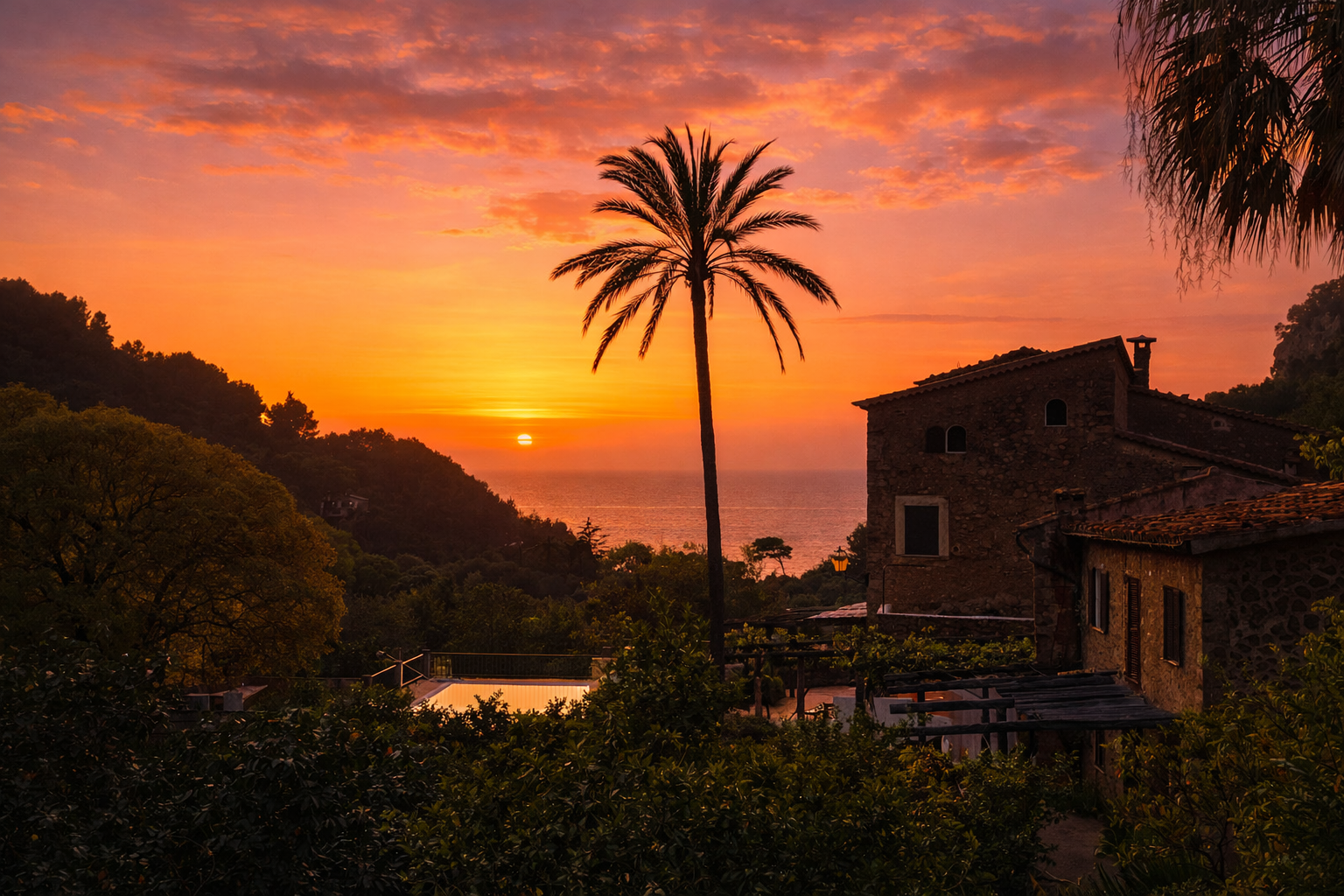 Sunset over a coastal landscape with a tall palm tree, a stone house, lush greenery, and a view of the ocean.