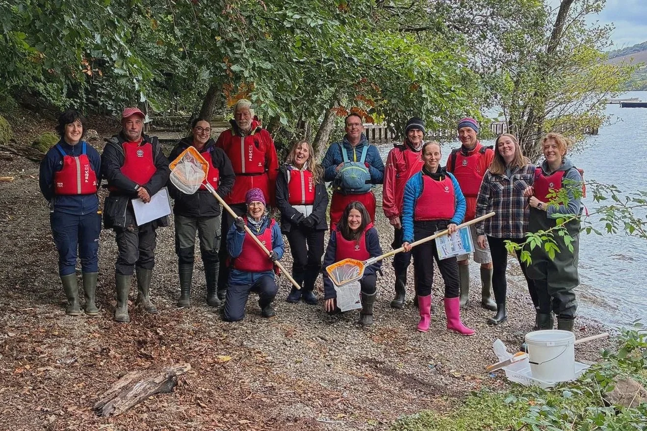 Lakefly volunteers gathered beside Ullswater after completing a freshwater sampling training session.