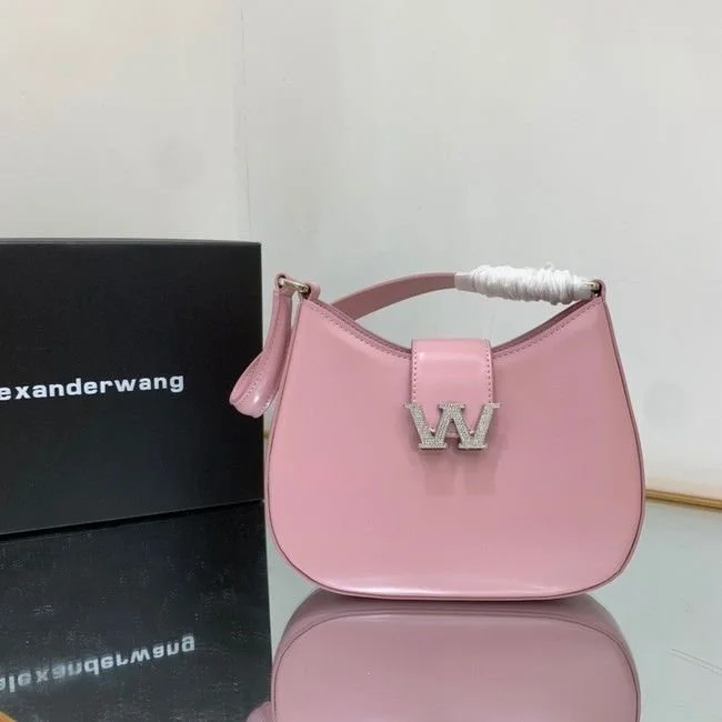 Pink handbag with a silver letter 'W' charm and a black Alexander Wang box in the background.