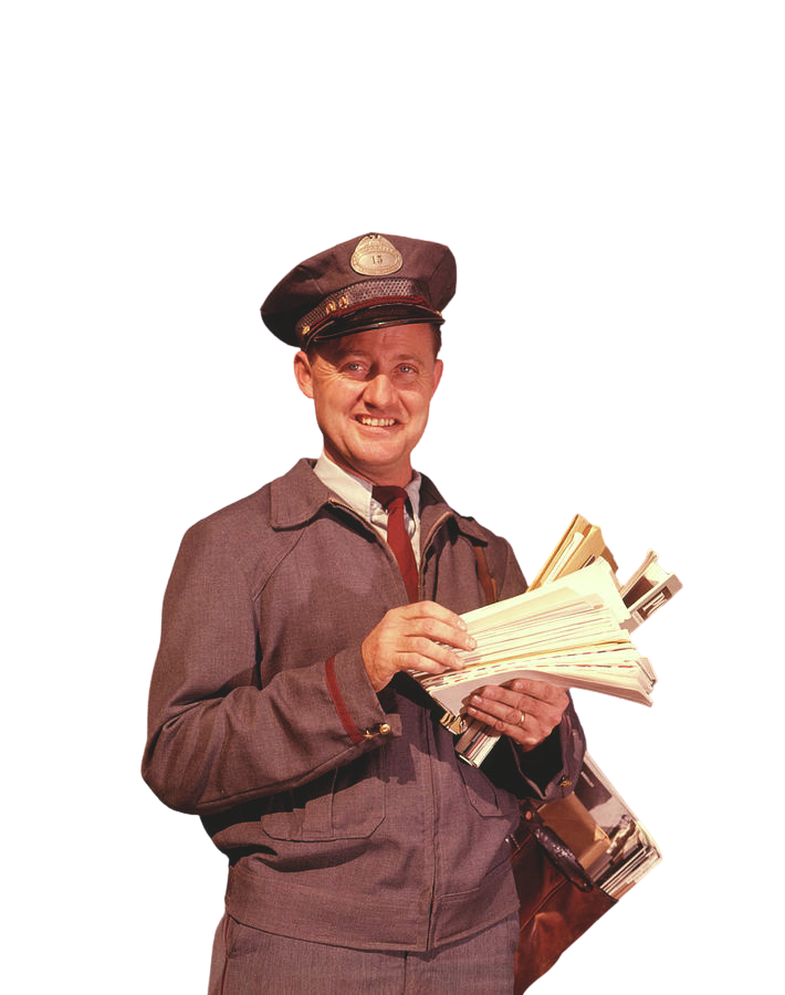 A man dressed as a postal worker from the mid-20th century, wearing a cap with a badge, holding a large stack of mail and packages, smiling at the camera.