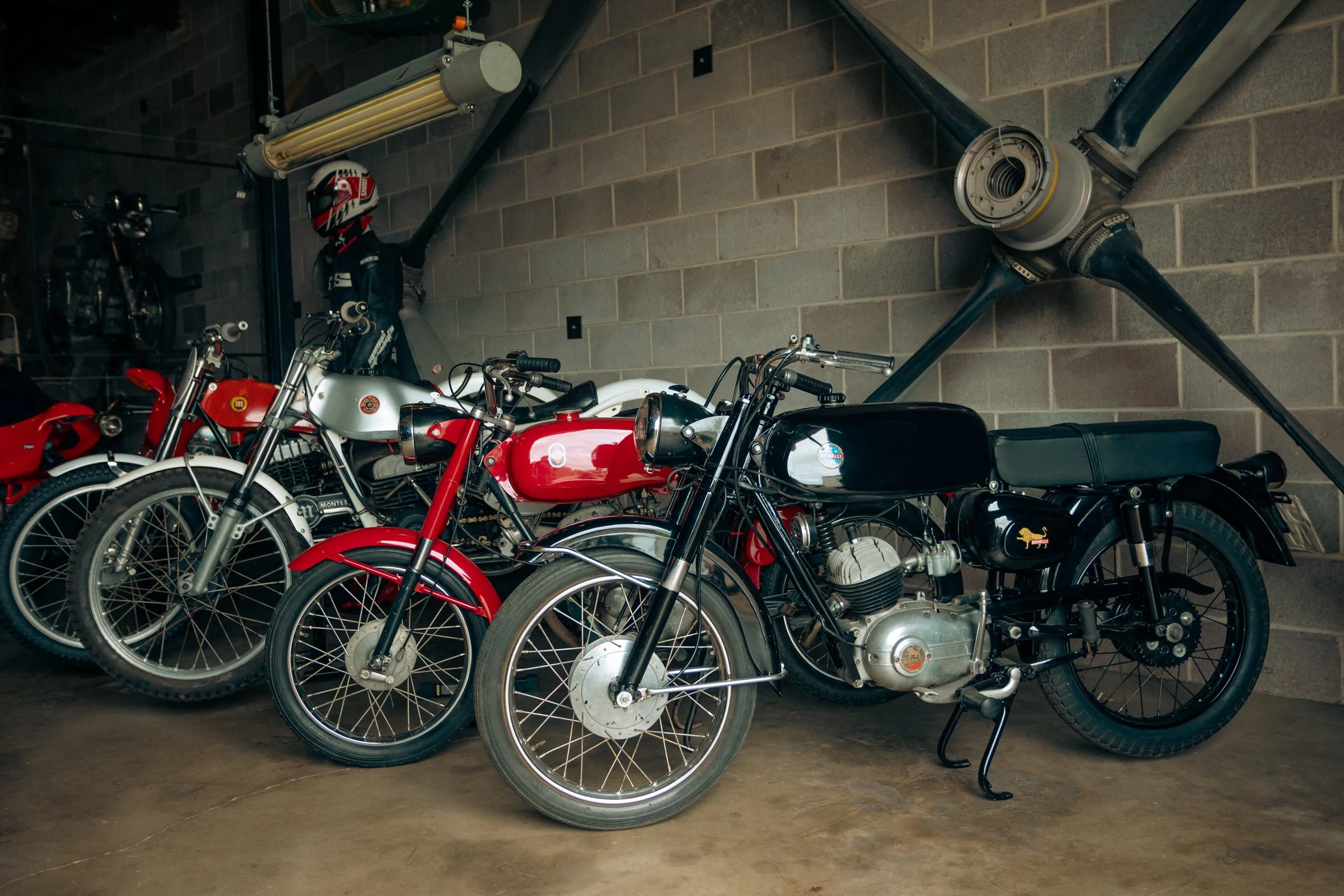 Motorcycles in row angled.jpg