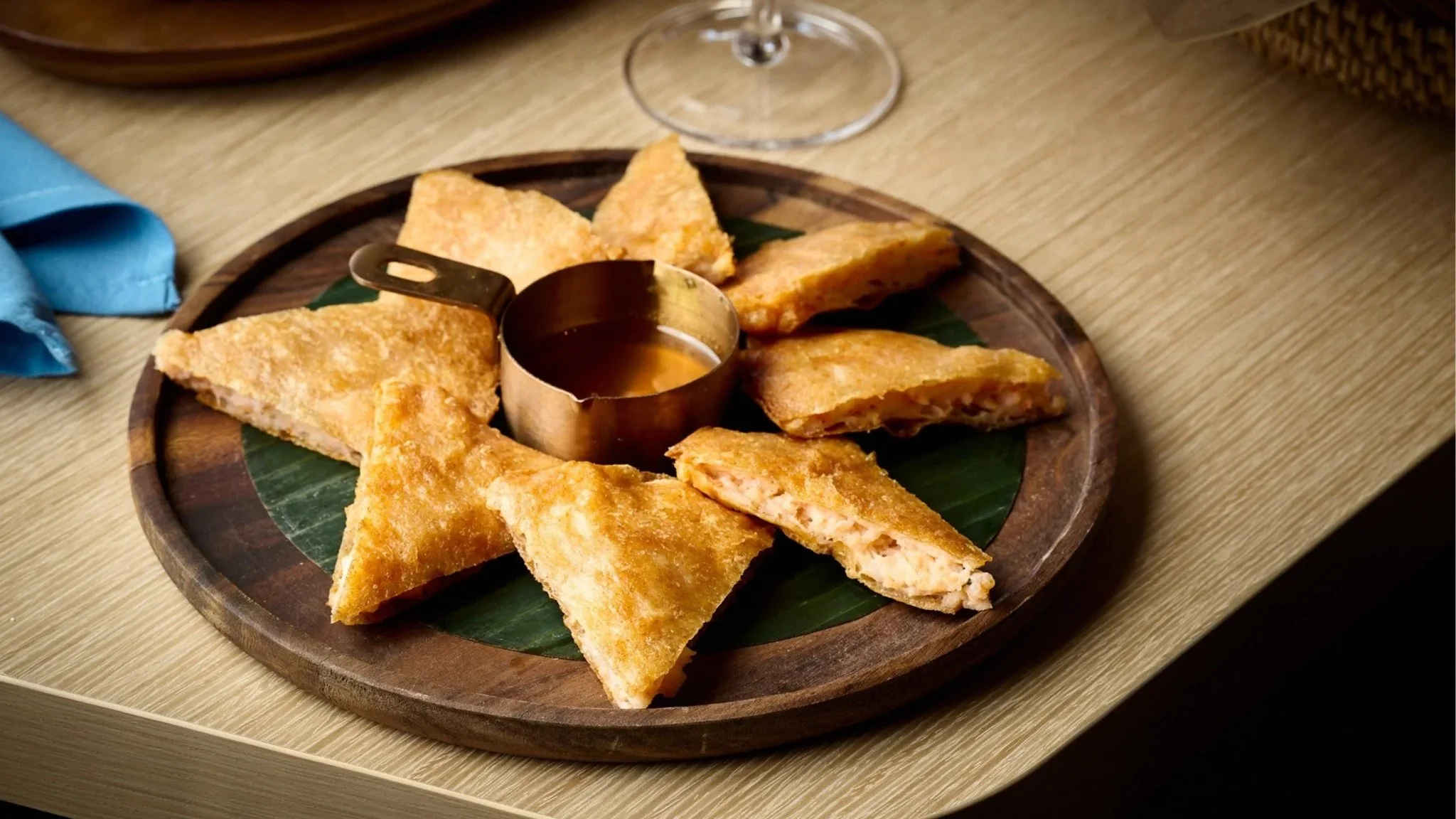 Very Thai Shrimp Mooncake, a golden fried Thai food served with dipping sauce, highlighting crunchy textures and bold flavors in LA Very Thai Westfield Century City.