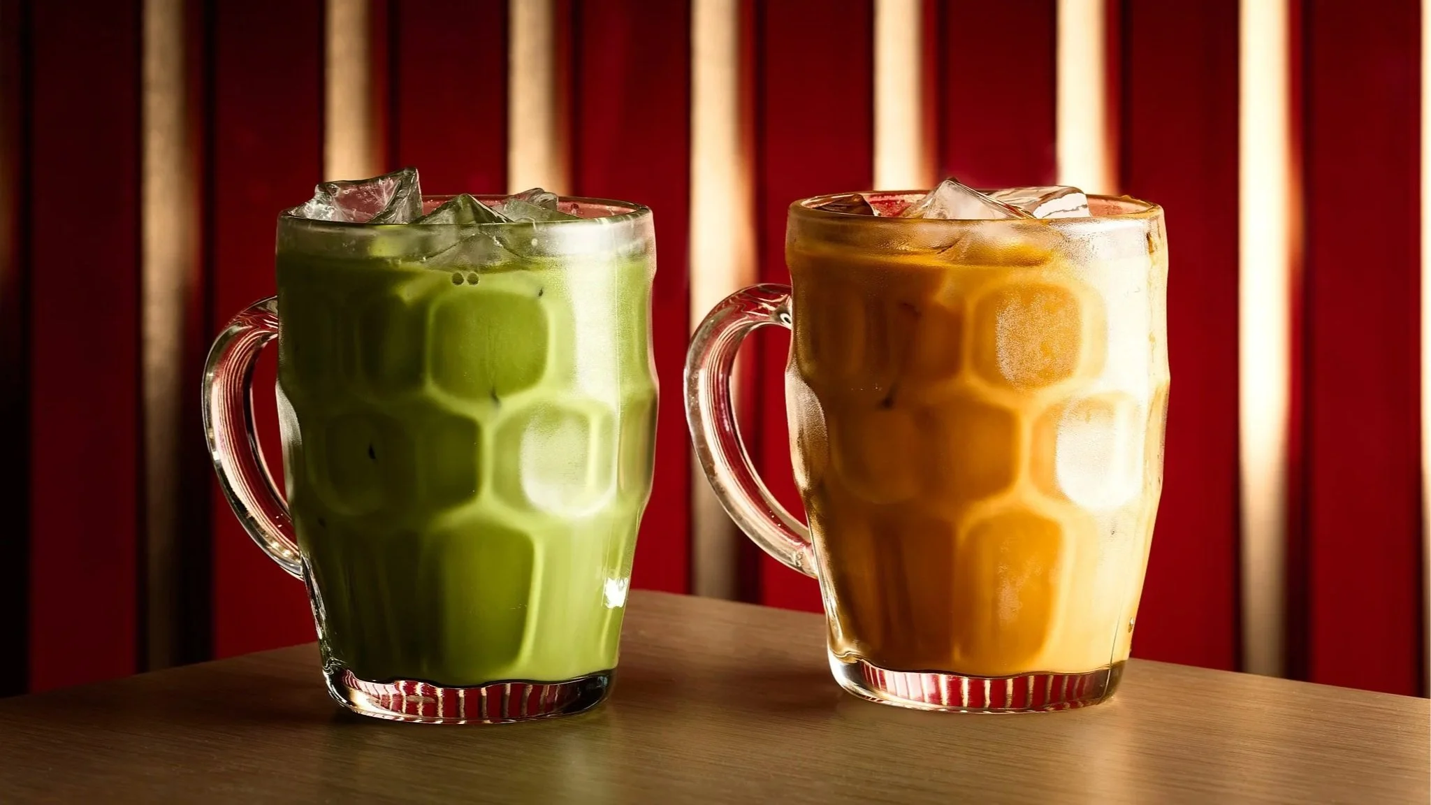 Refreshing Thai iced tea and jasmine milk tea served in glass mugs, combining traditional flavors with a modern presentation in LA Very Thai Westfield Century City.