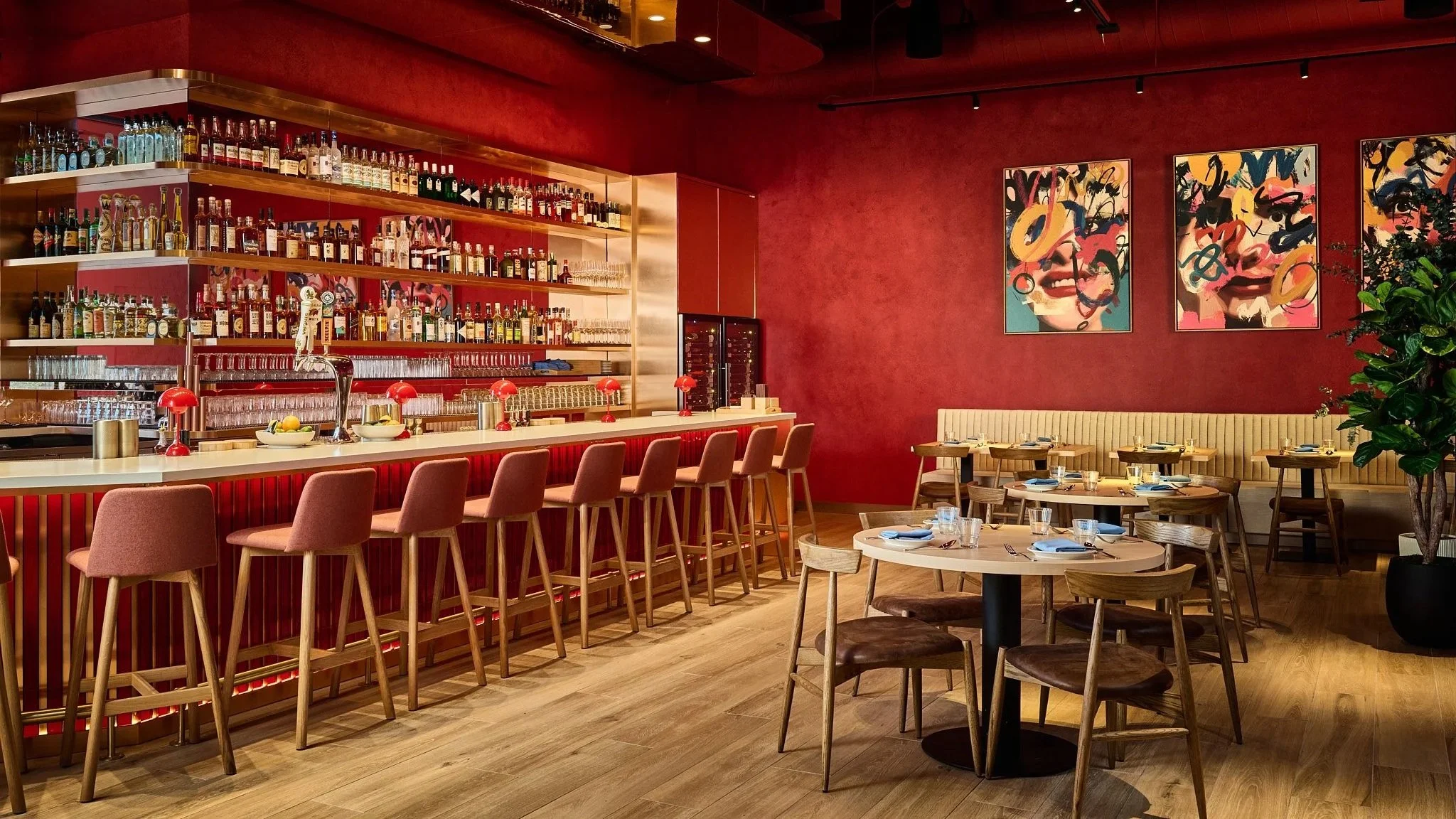 Modern Thai bar setup displaying a wide selection of beverages in a vibrant and energetic space in LA Very Thai Westfield Century City..