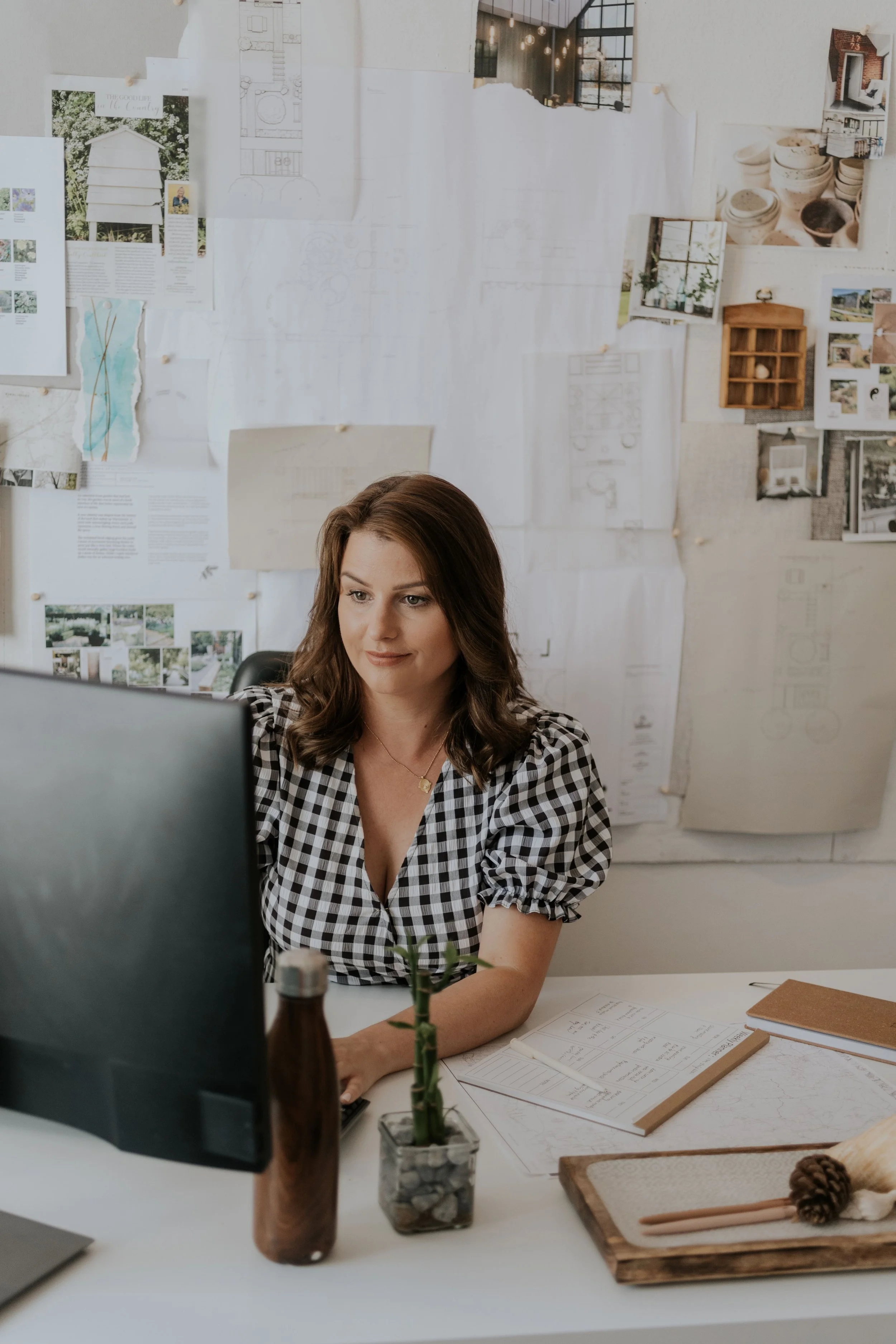 Diane at desk on computer
