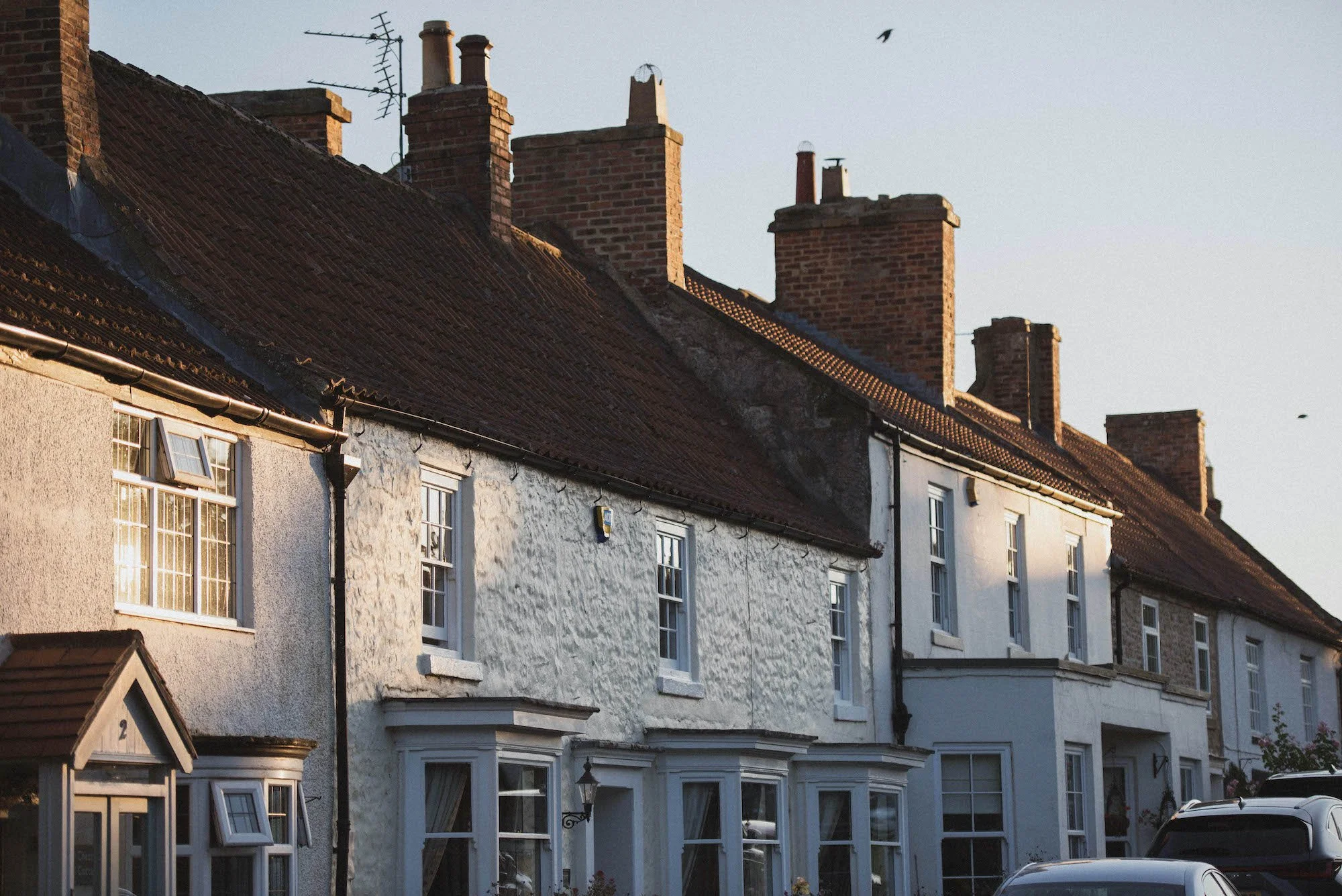 Row of traditional cottages on West Green in Heighington