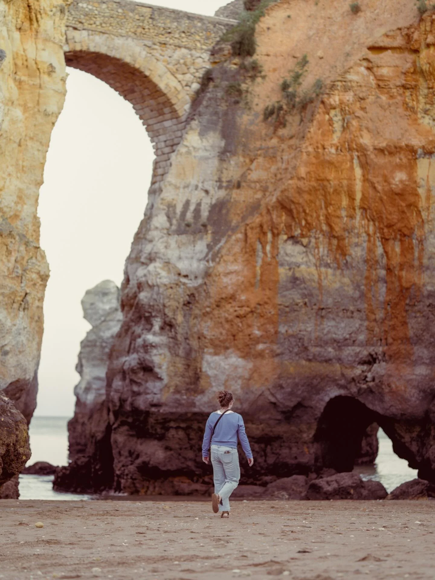 Stephanie walking the beach in Lagos