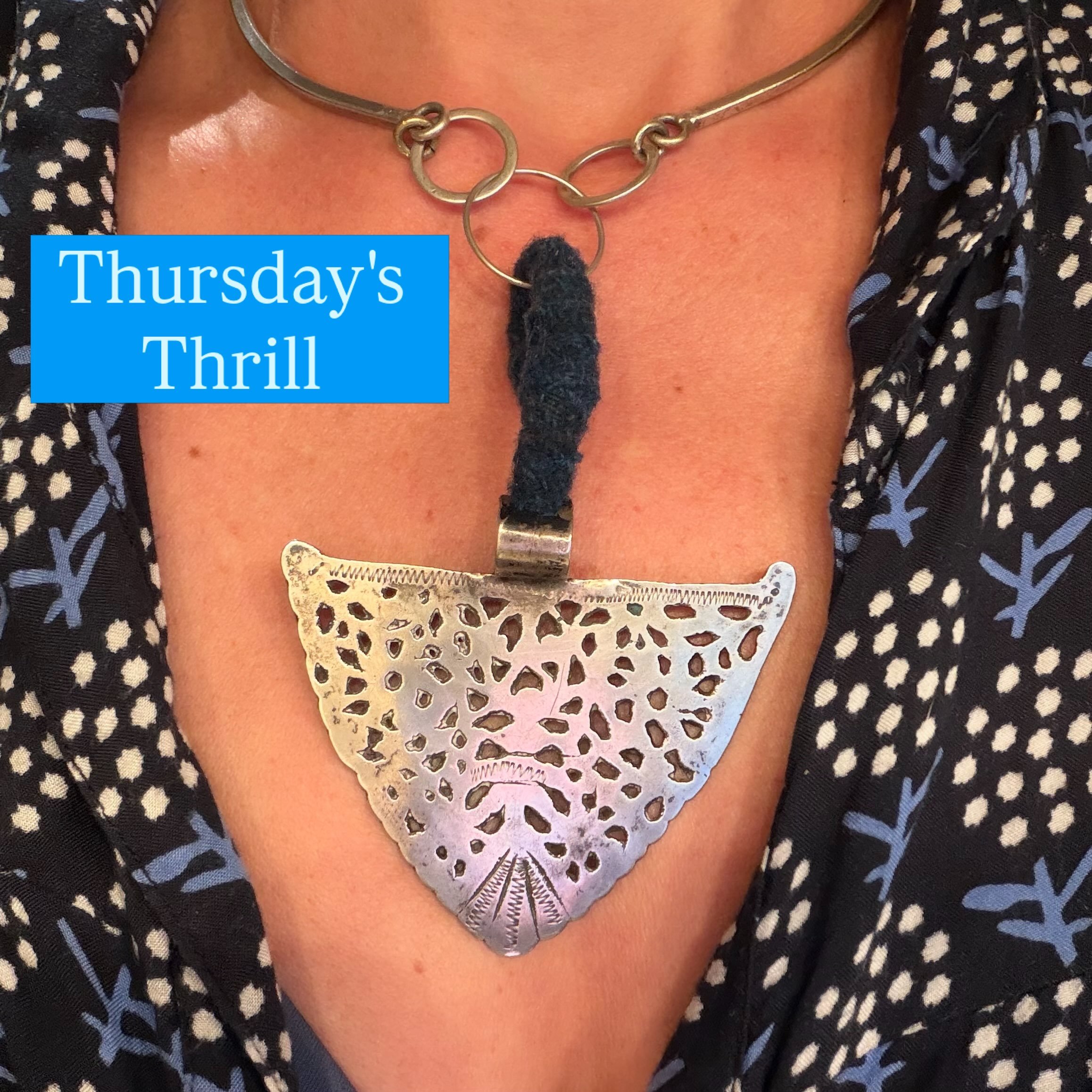 Statement Necklace! 
Sterling silver hand tooled "shield" wrapped with blue silk &amp; wool thread on vintage handmade link chain. 
#statementnecklace #vintagejewelrycrafts