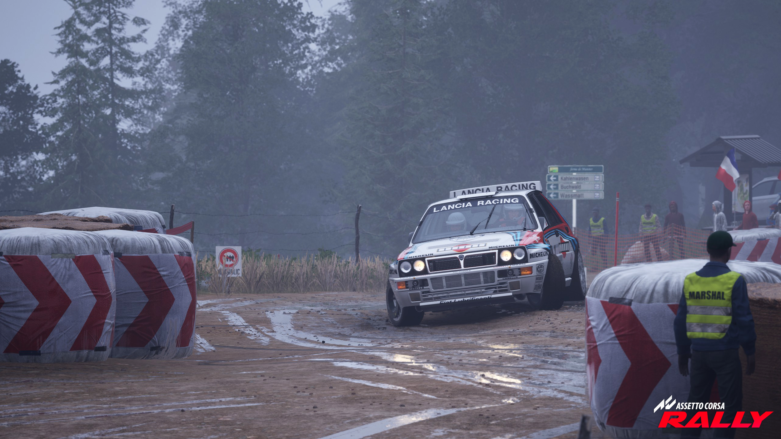 Lancia 037 threads a chicane in the wet.