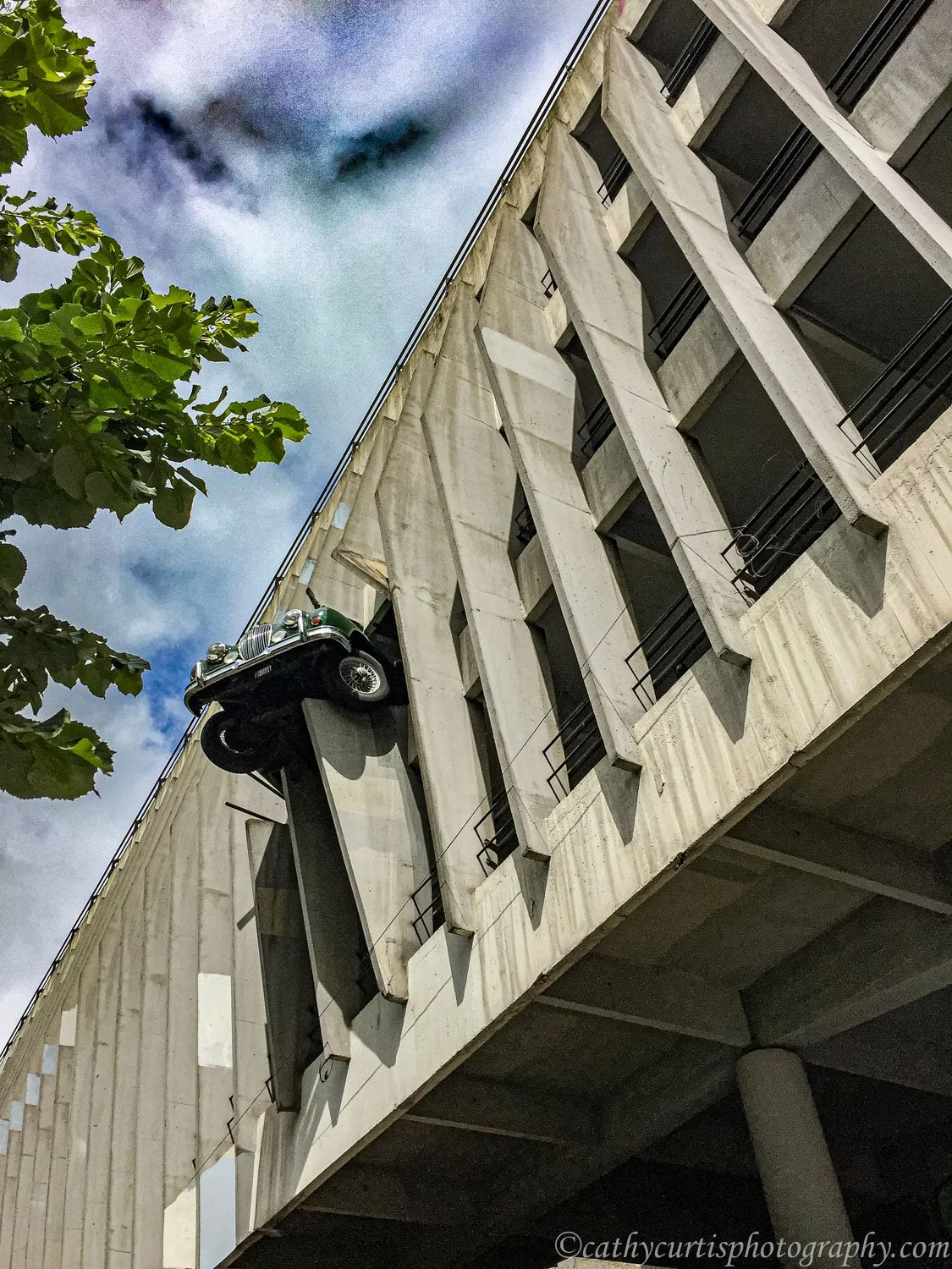 Car coming out bldg.jpg