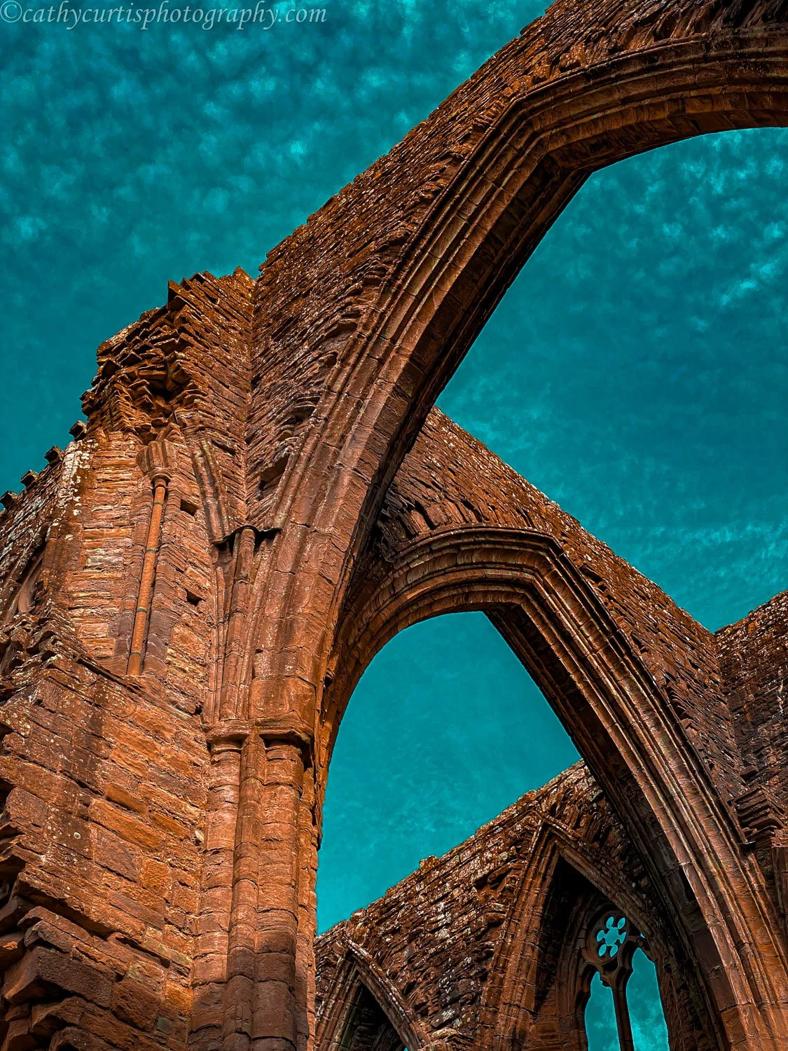 Open Arch Bright blue sky.jpg