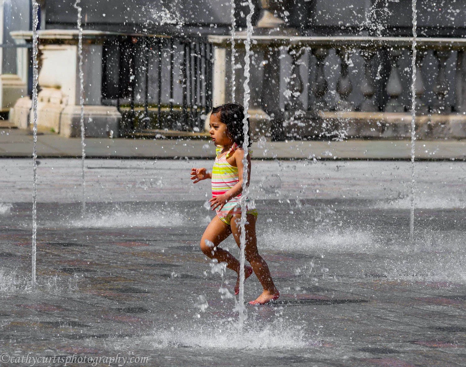 Girl running through water resized.jpg
