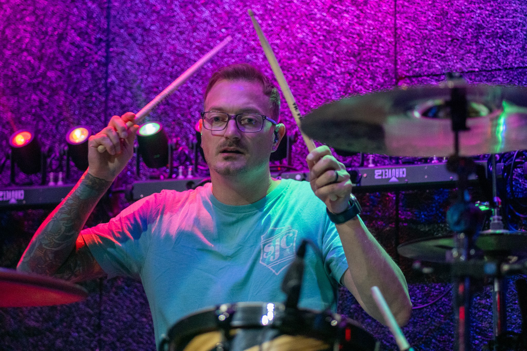 Dan beating the drums on-stage in Baltimore
