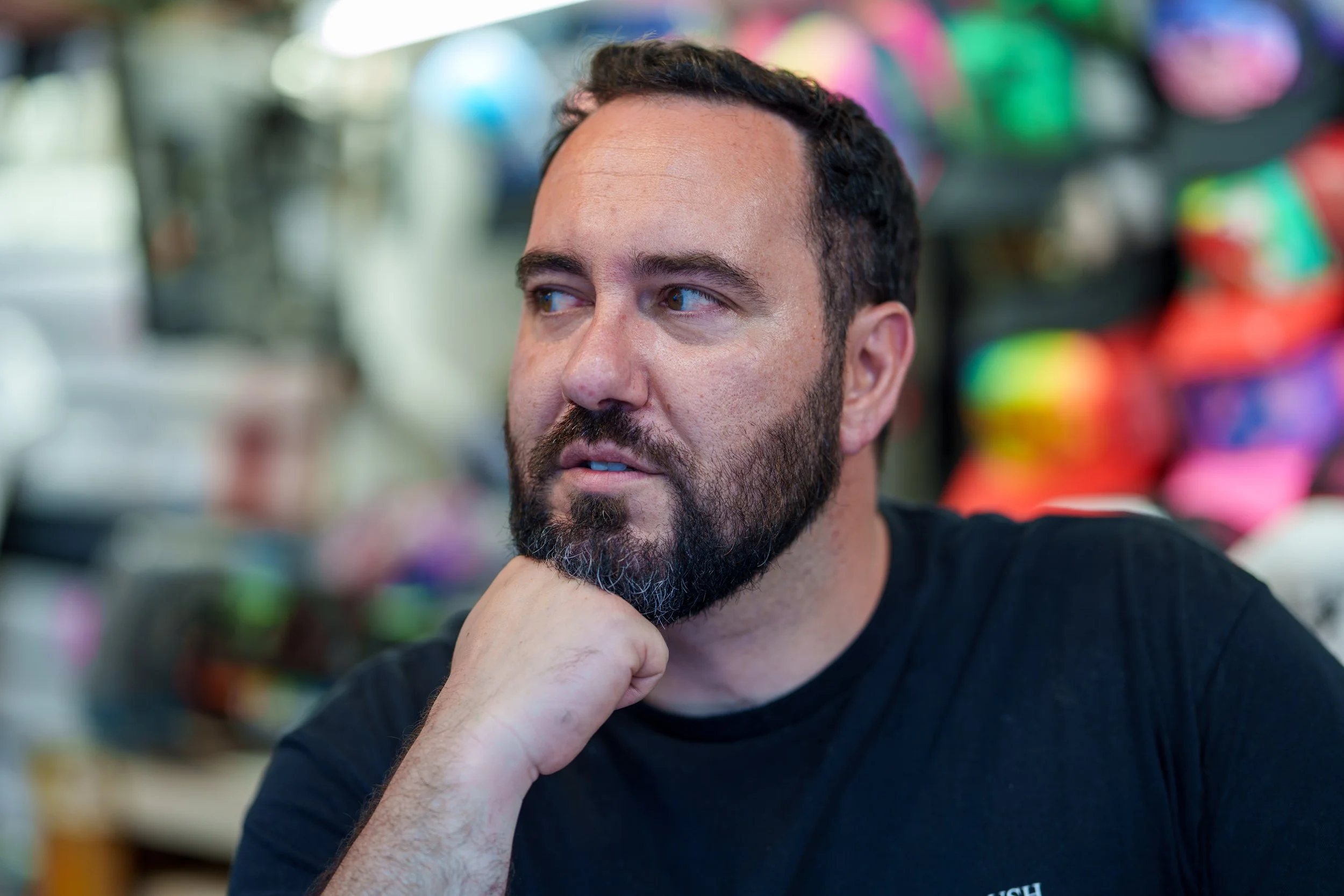 Old Orchard Beach Airbrush Owner Noah deep in thought
