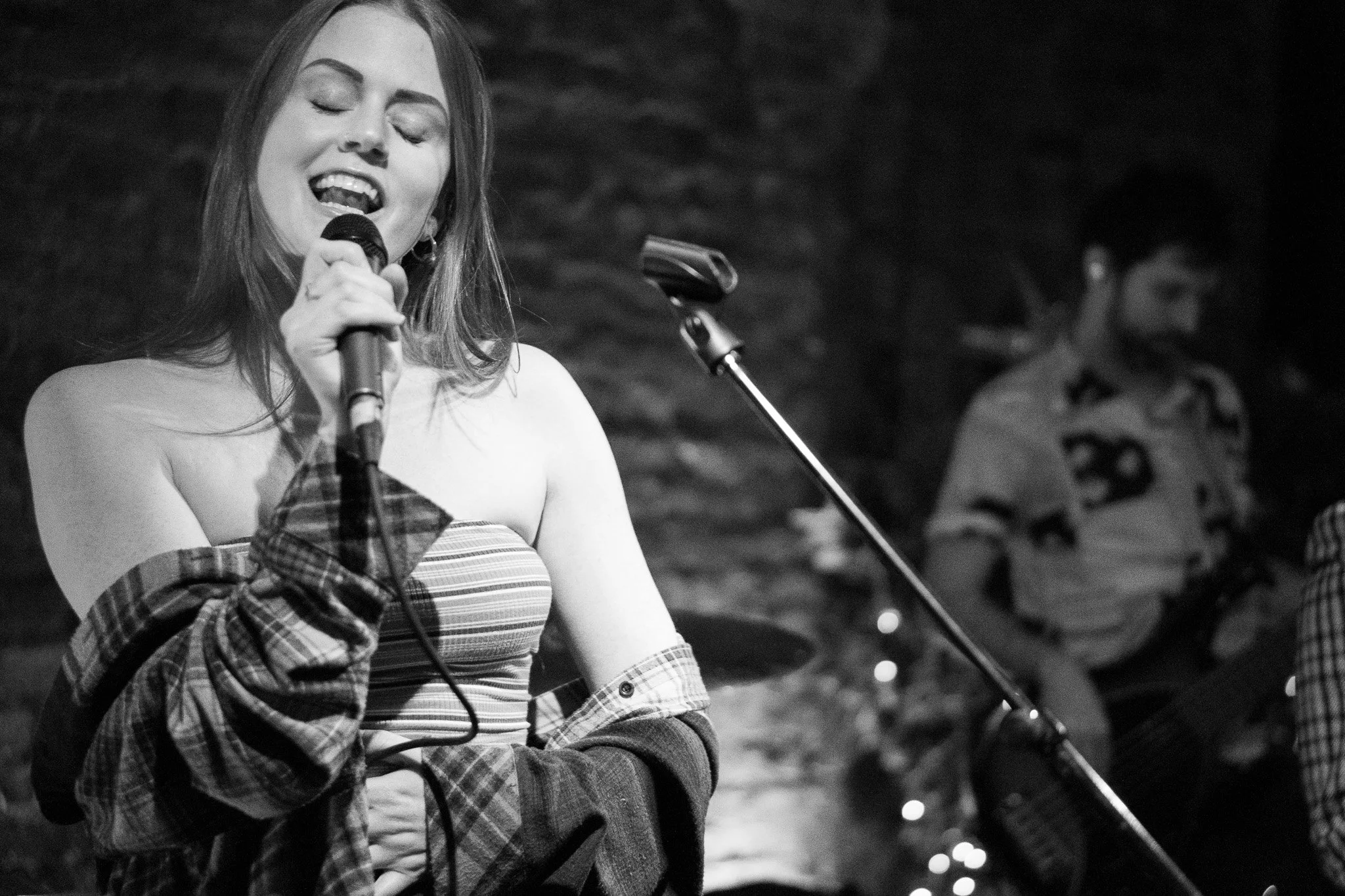 Female vocalist performing with her band in Raleigh, NC.