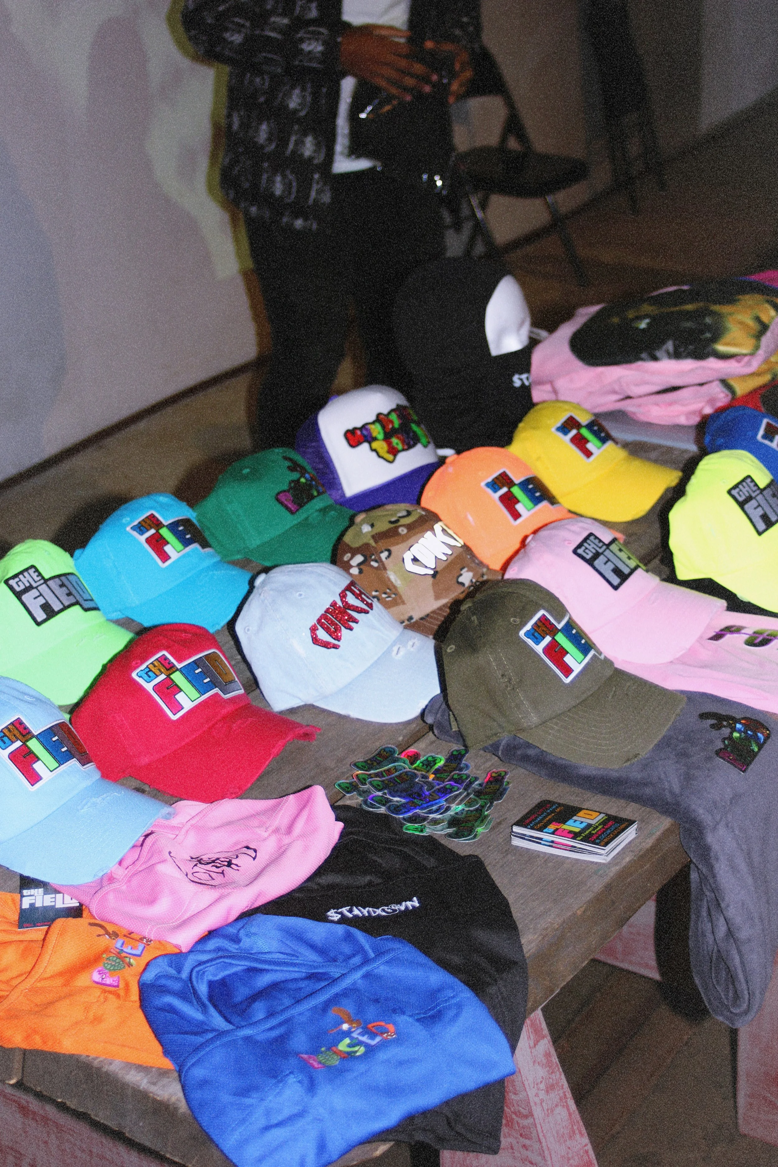 Photo of vendor hats from merchandise table