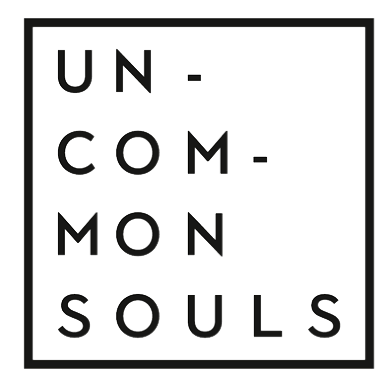 Black background with white outlined text reading "UN- COM- MON SOULS" arranged vertically in the center.