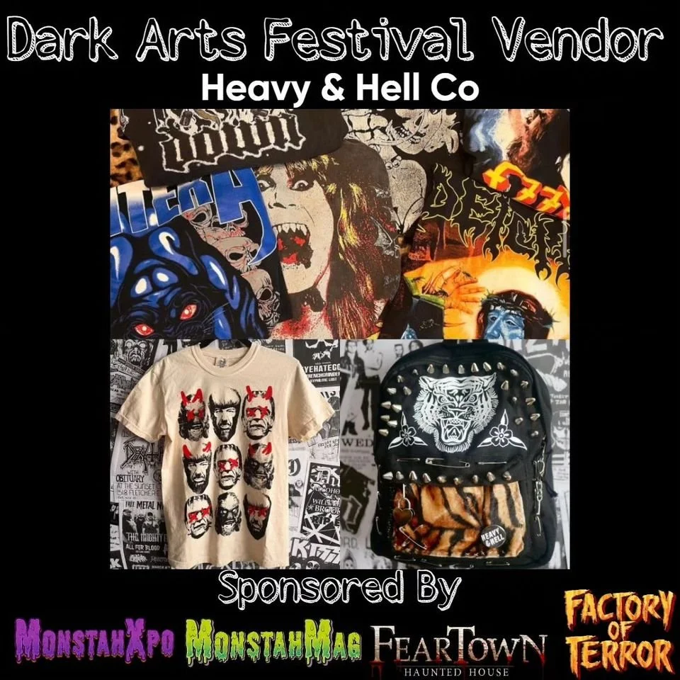 A display at the Dark Arts Festival showcasing a Heavy & Hell Co vendor booth. The booth features band patches, a T-shirt with red devil faces, a backpack with a tiger design, and posters in the background promoting metal bands and events.