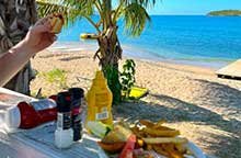 Lunch on the beach with Buck Island in the distance