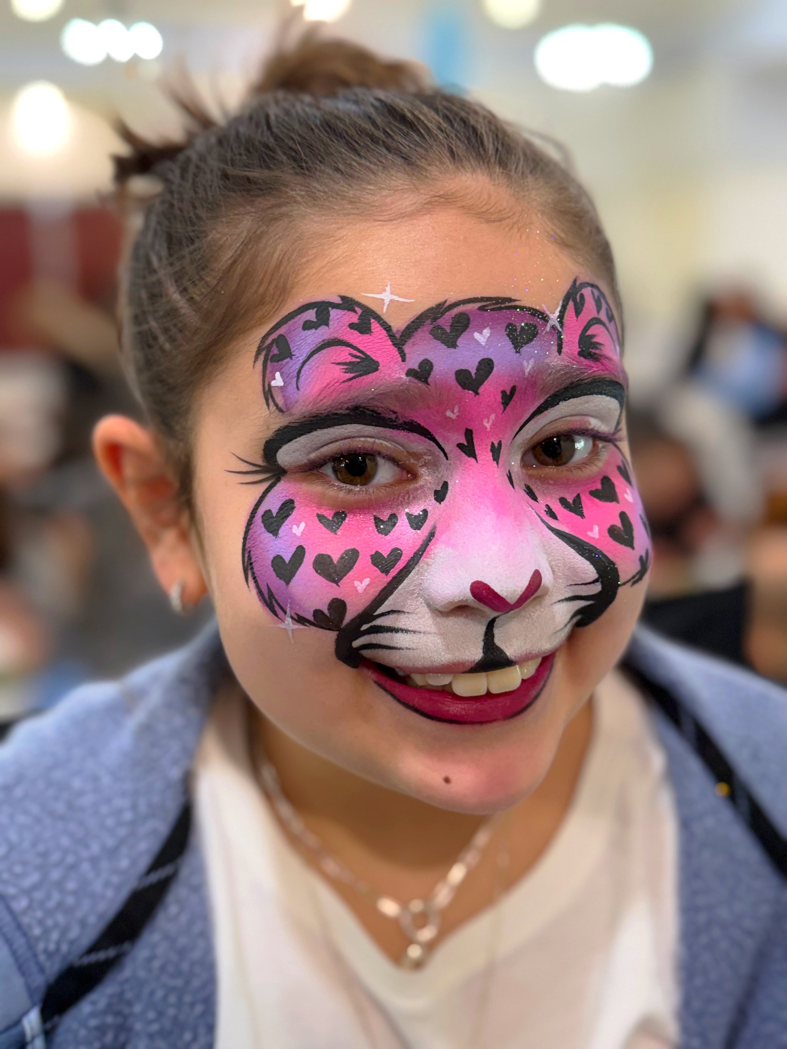 cute valentine day face painting design for kids hearts pink gradient
