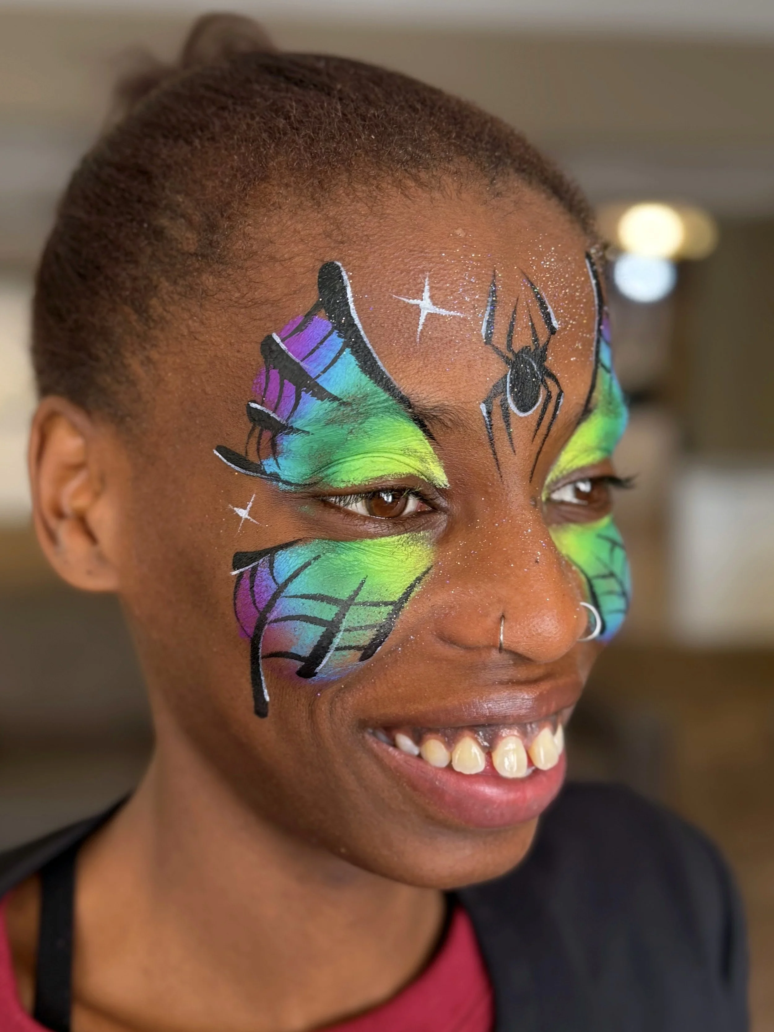 pretty halloween face painting that works well on darker skin tones