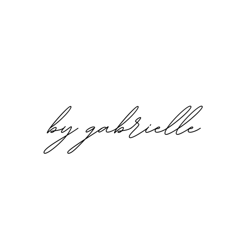 Handwritten text reading 'by gabrielle' on a white background.