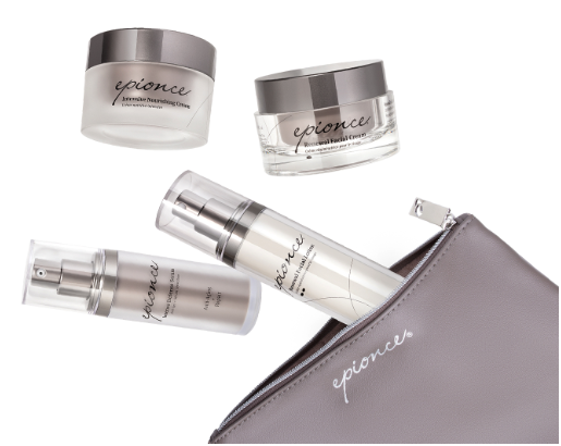 Collection of skincare products including a cream jar, a gel jar, a spray bottle, and a pump bottle with a gray pouch.