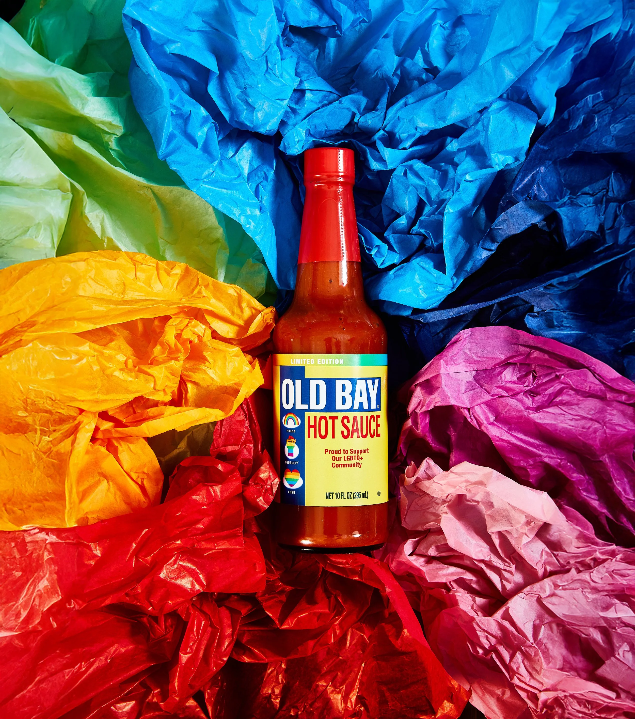 old_bay_hot_sauce_pride_edition_whitebox_single_bottle_rainbow_props_18701_v2.jpg