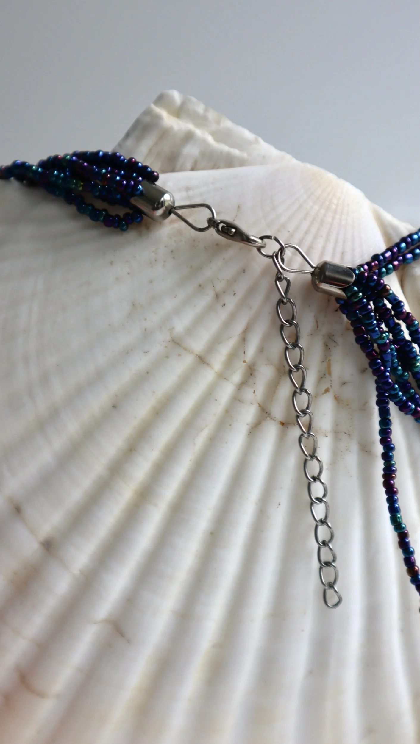 Clasp of blue bead necklace