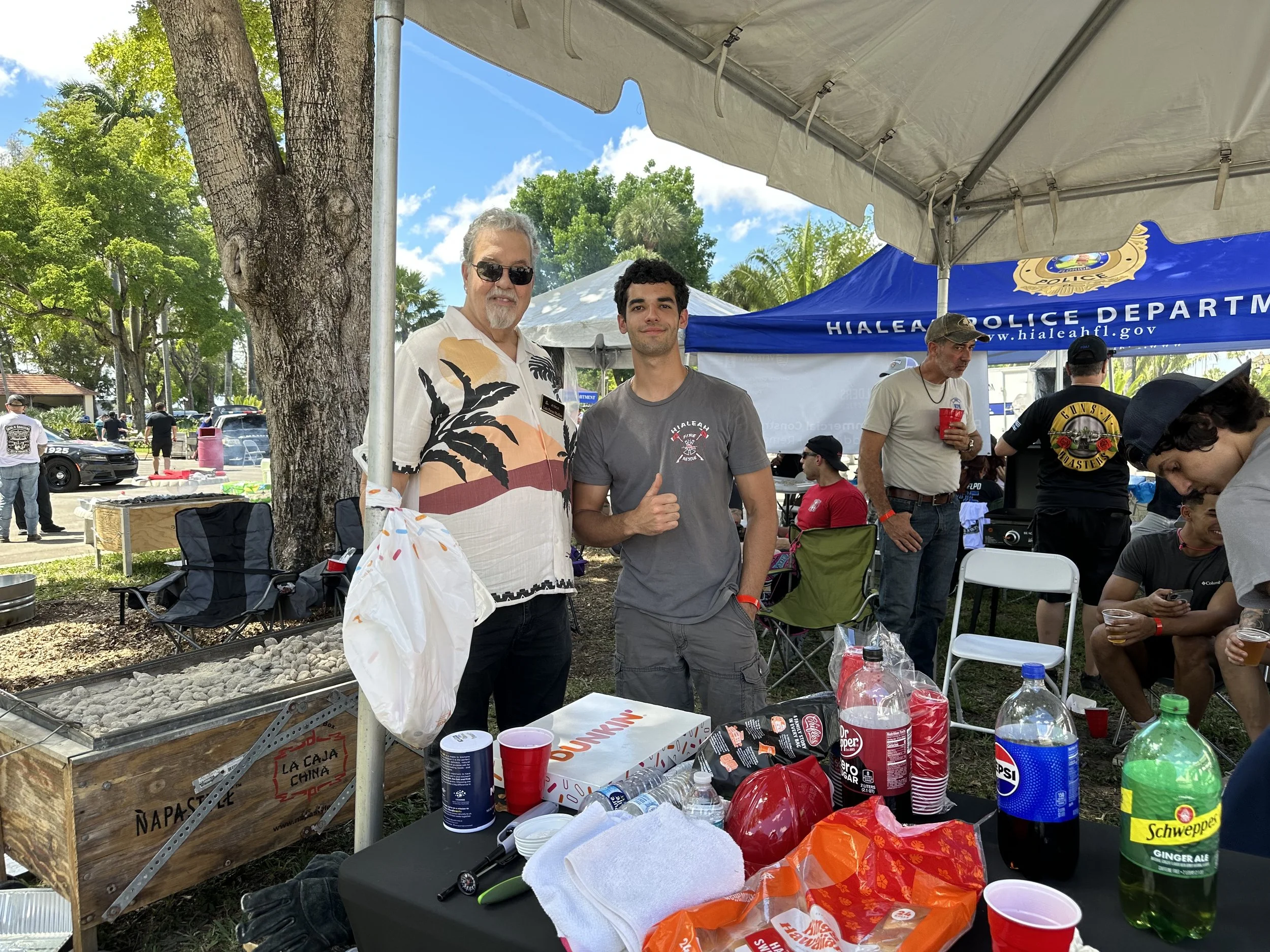 Me with young firefighter.jpeg