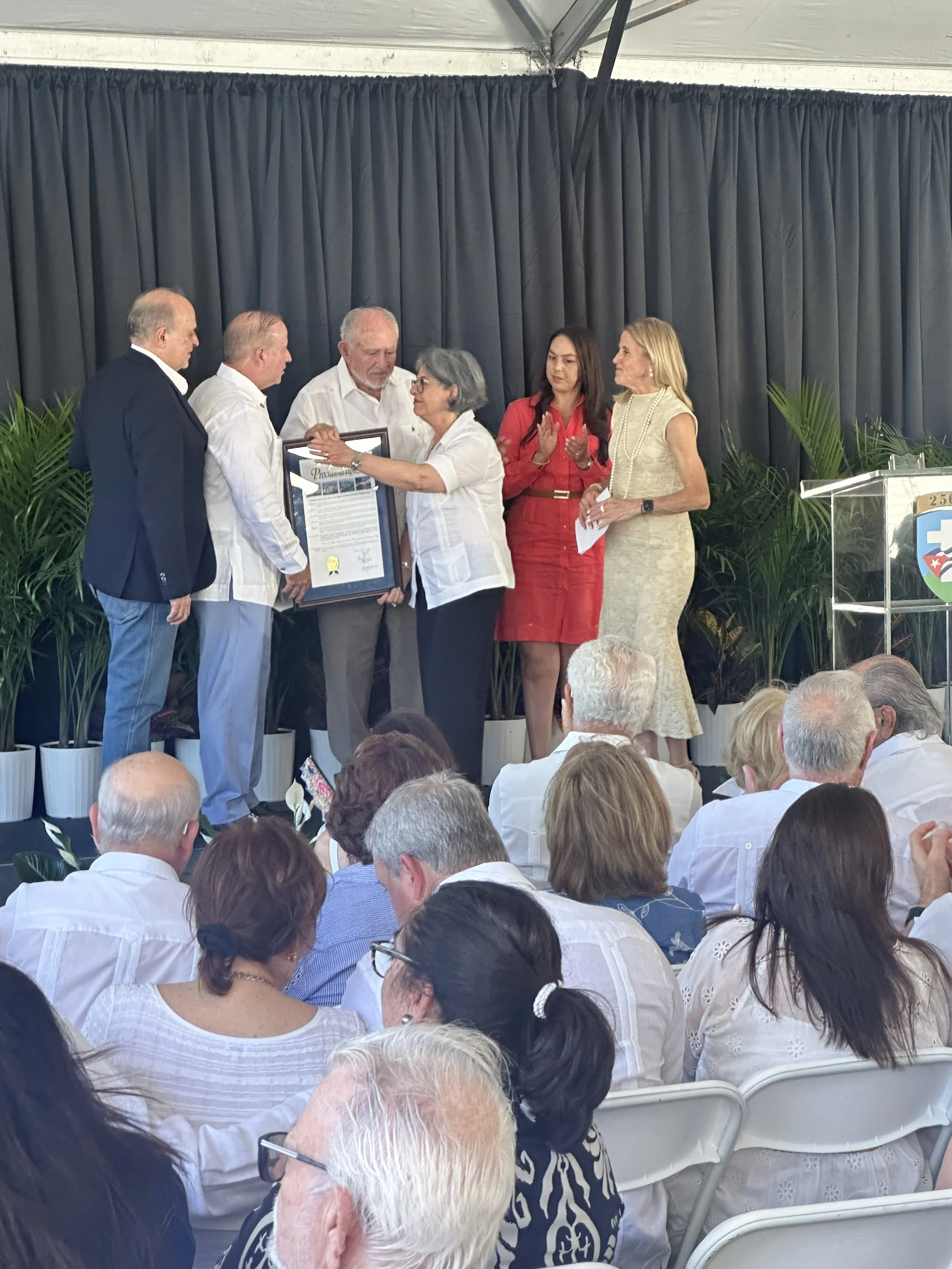 Brigade Photo with Mayor giving plaque.jpeg