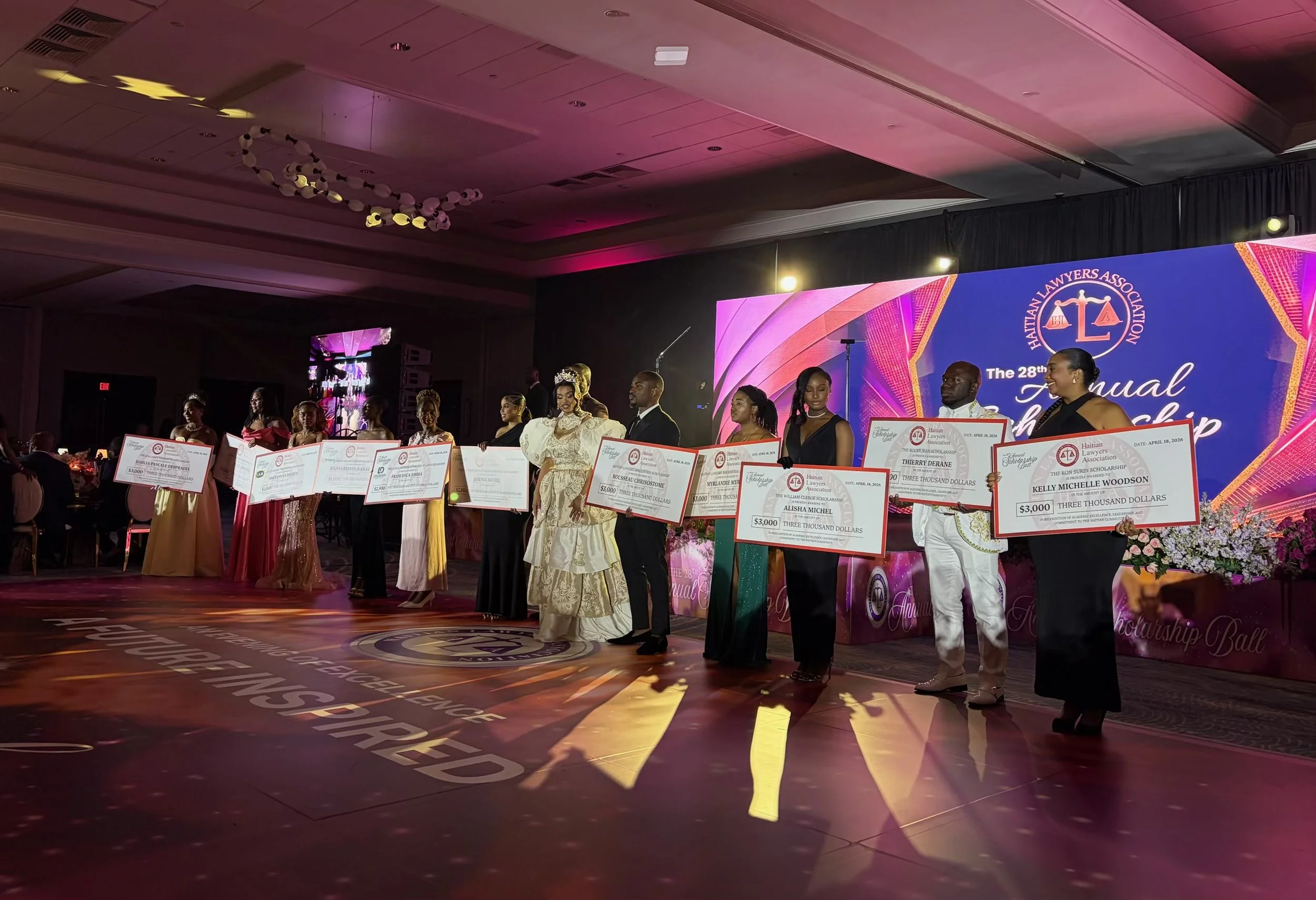 HLA Students with checks.jpeg