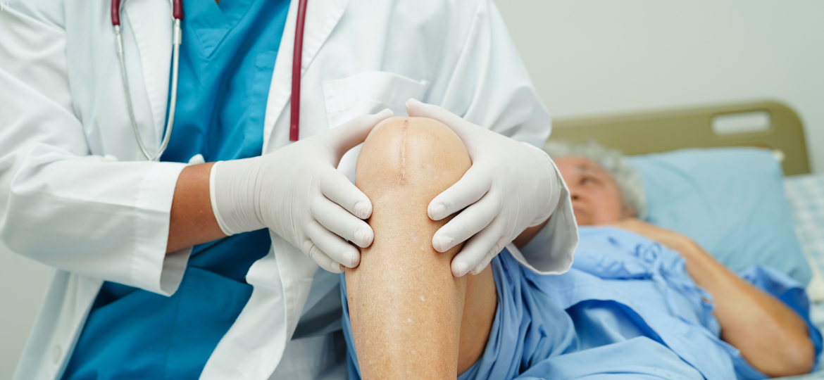 Clinical translation of laser bone sculpting for total knee replacements