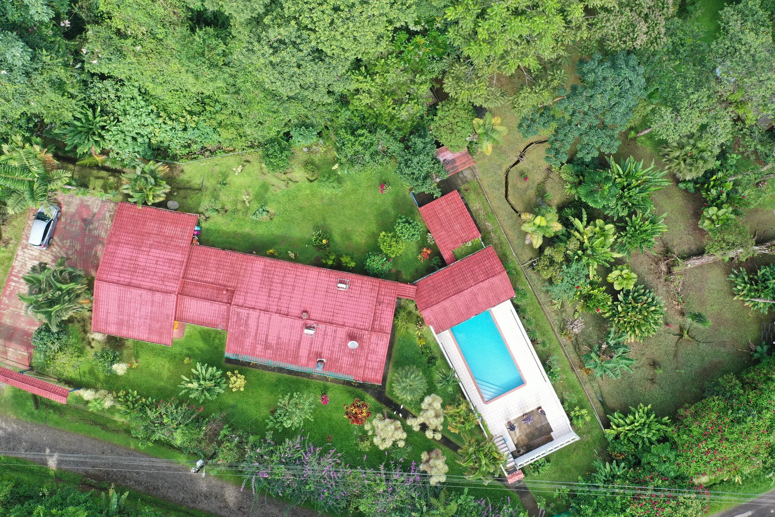 Aerial view of a house in Costa Rica. It has a guest house which is an income producing airbnb