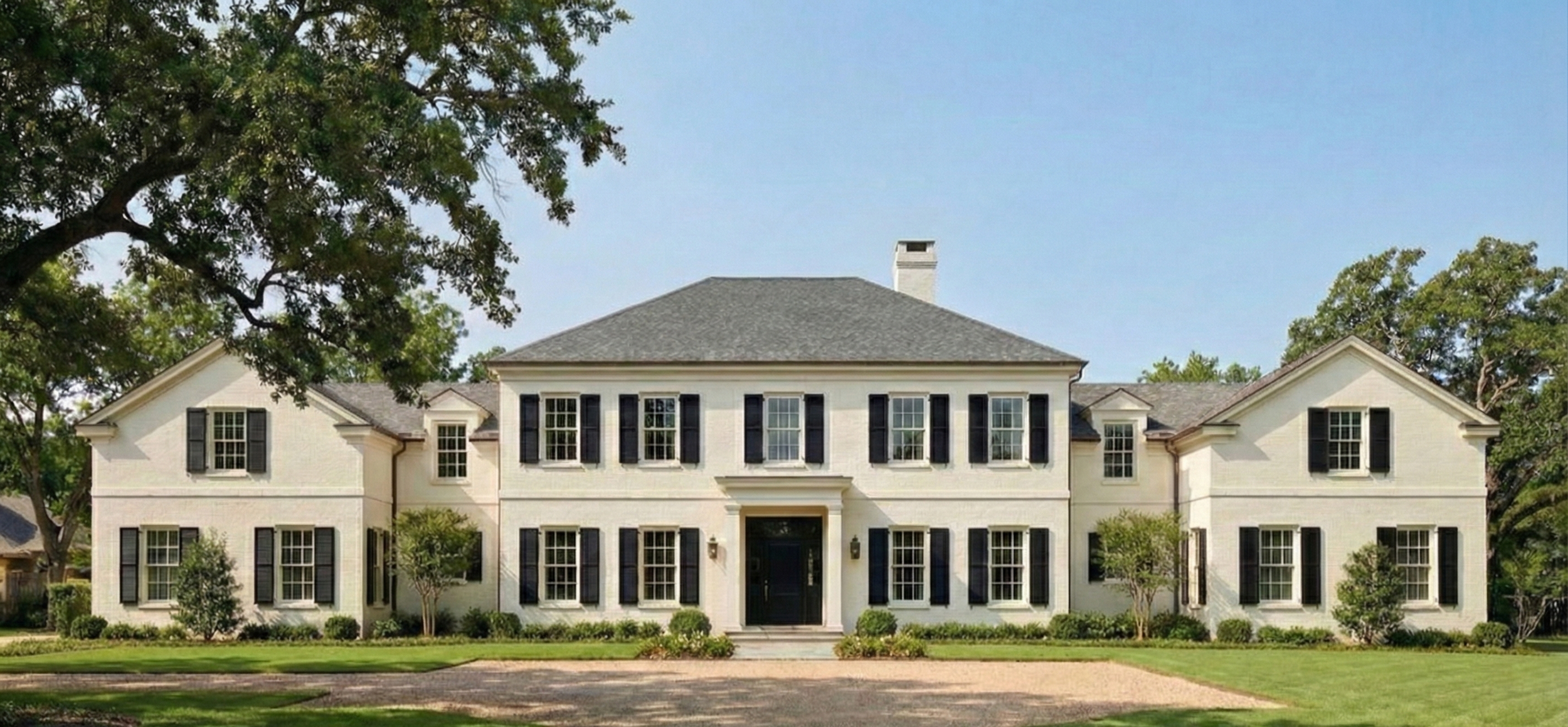 The "Tartans" Painted Brick Estate - A timeless and solid-looking estate home built with painted brick, offering a classic look that is currently very popular.